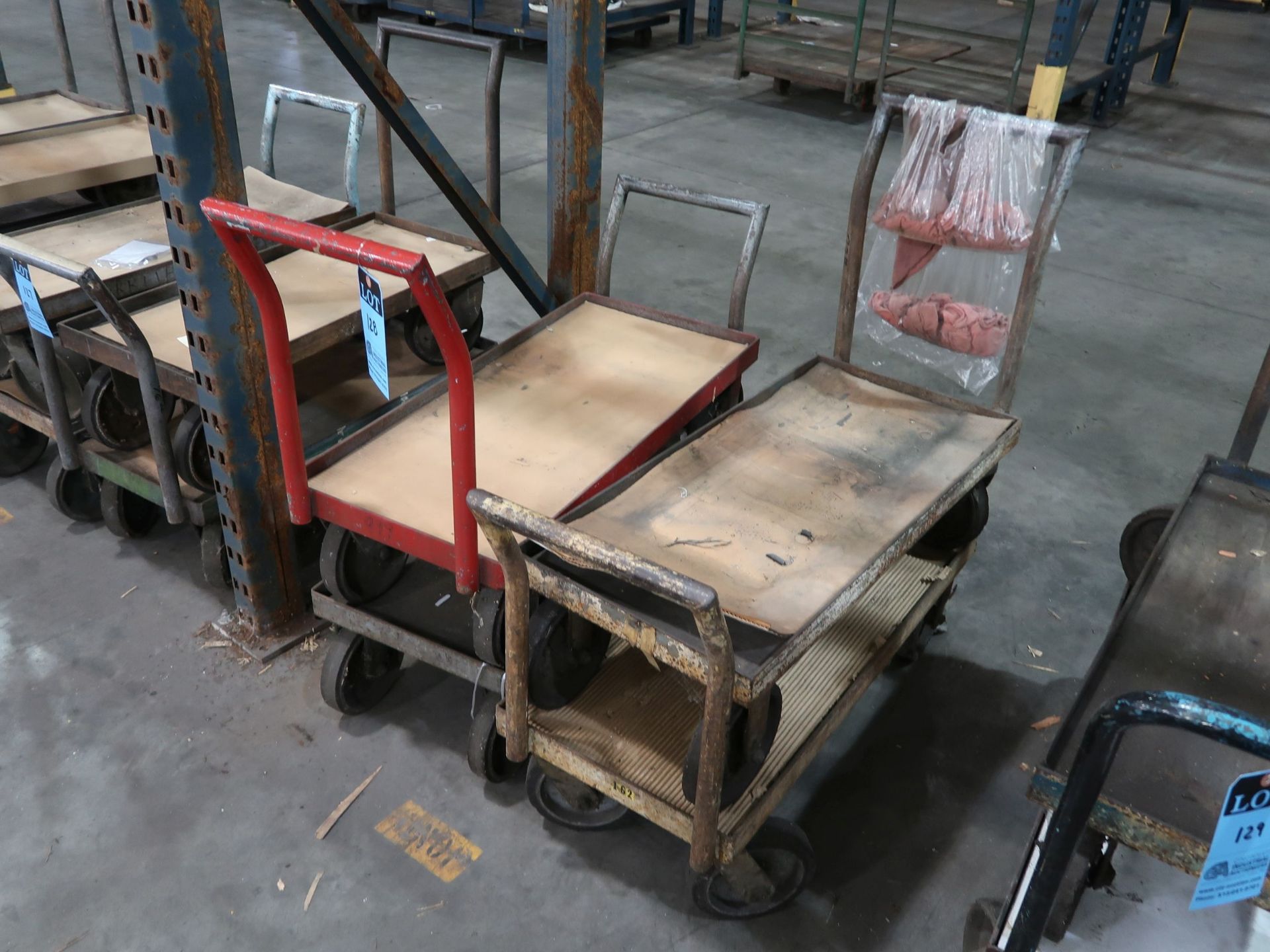 (LOT) (4) 17" X 37" STEEL FRAMED CARTS