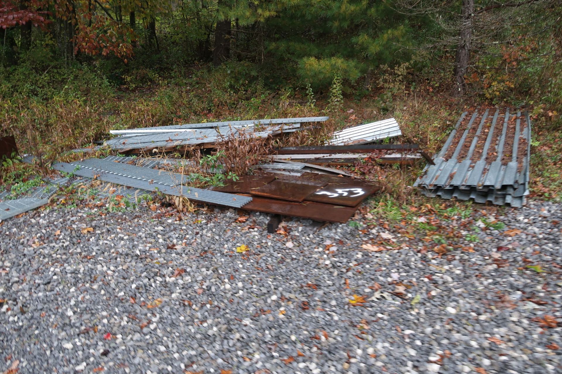 (LOT) LARGE QUANTITY OF ASSORTED STEEL STRUCTURAL ON GROUND AT OUTER PERIMETER OF DRIVE WAY - SEE - Image 8 of 10