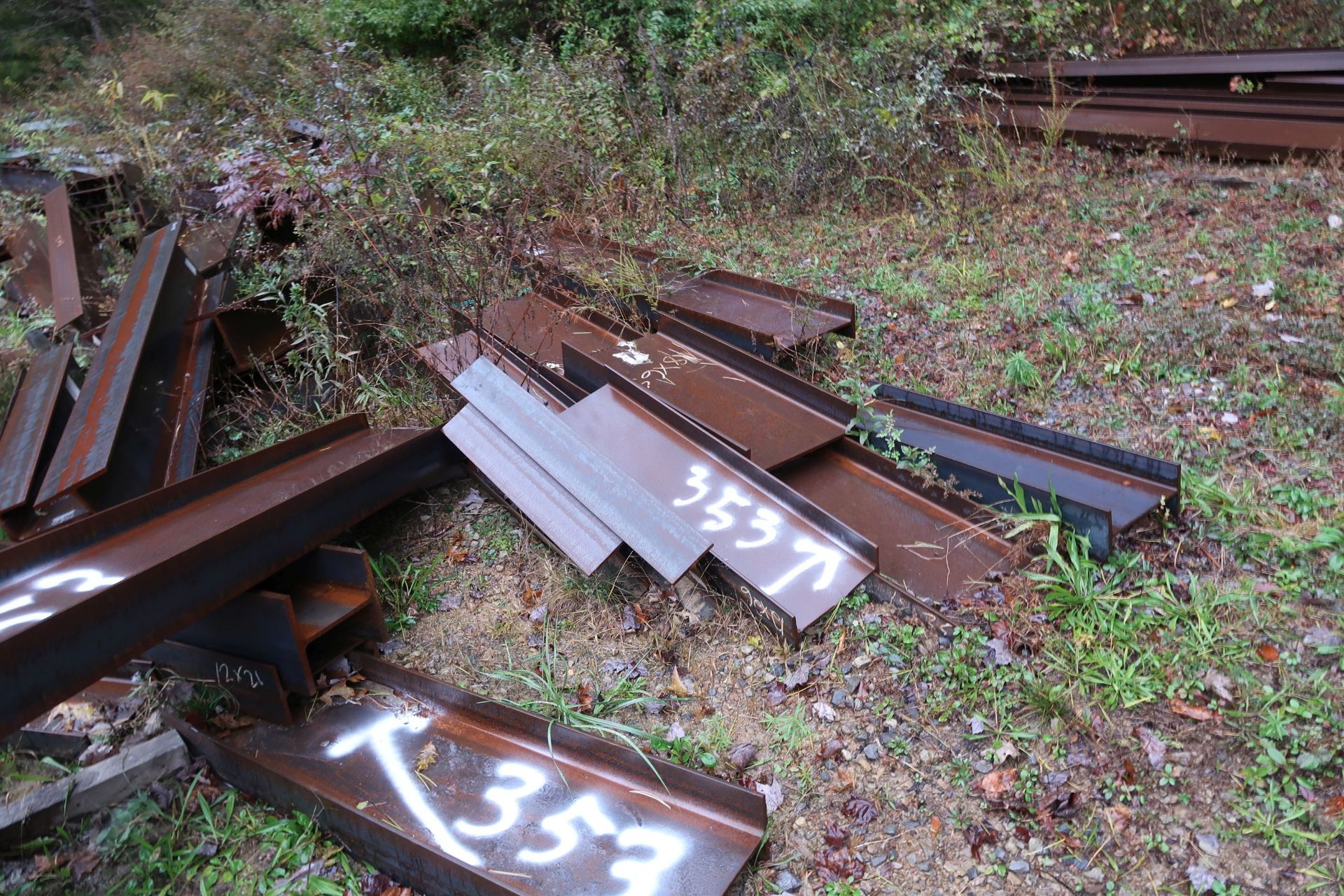 (LOT) LARGE QUANTITY OF ASSORTED STEEL STRUCTURAL ON GROUND AT OUTER PERIMETER OF DRIVE WAY - SEE - Image 3 of 10