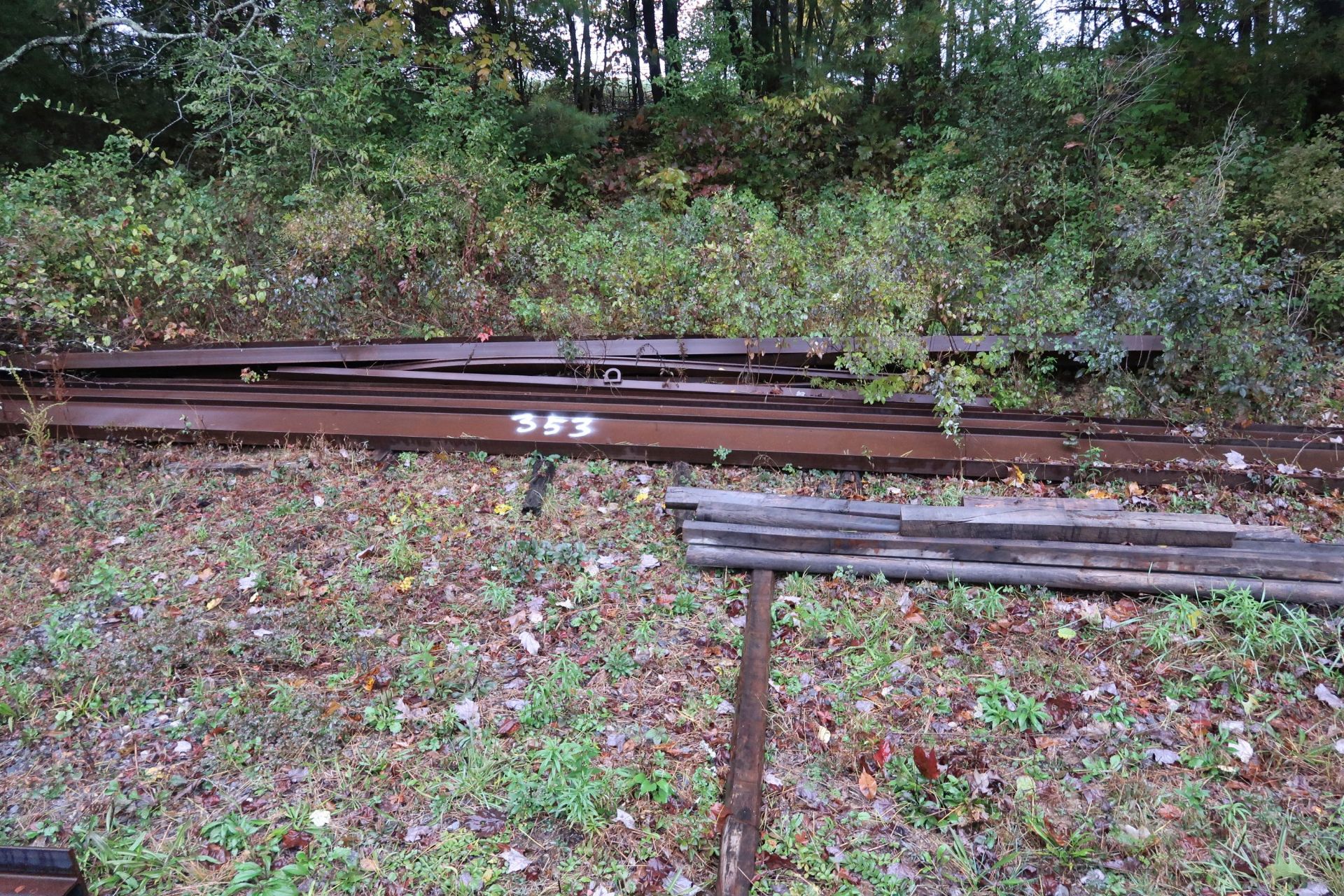 (LOT) LARGE QUANTITY OF ASSORTED STEEL STRUCTURAL ON GROUND AT OUTER PERIMETER OF DRIVE WAY - SEE - Image 2 of 10