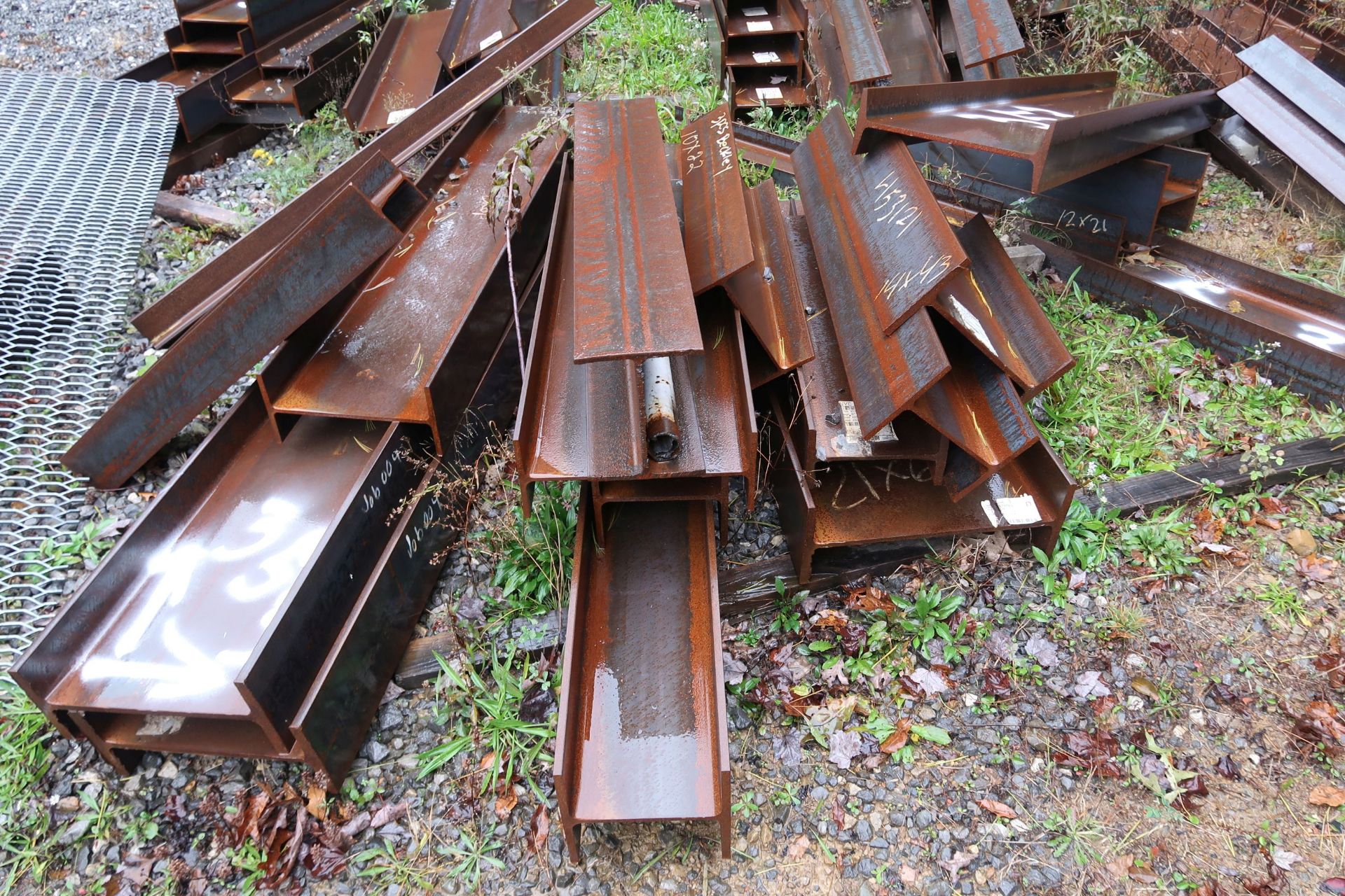 (LOT) LARGE QUANTITY OF ASSORTED STEEL STRUCTURAL ON GROUND AT OUTER PERIMETER OF DRIVE WAY - SEE - Image 4 of 10