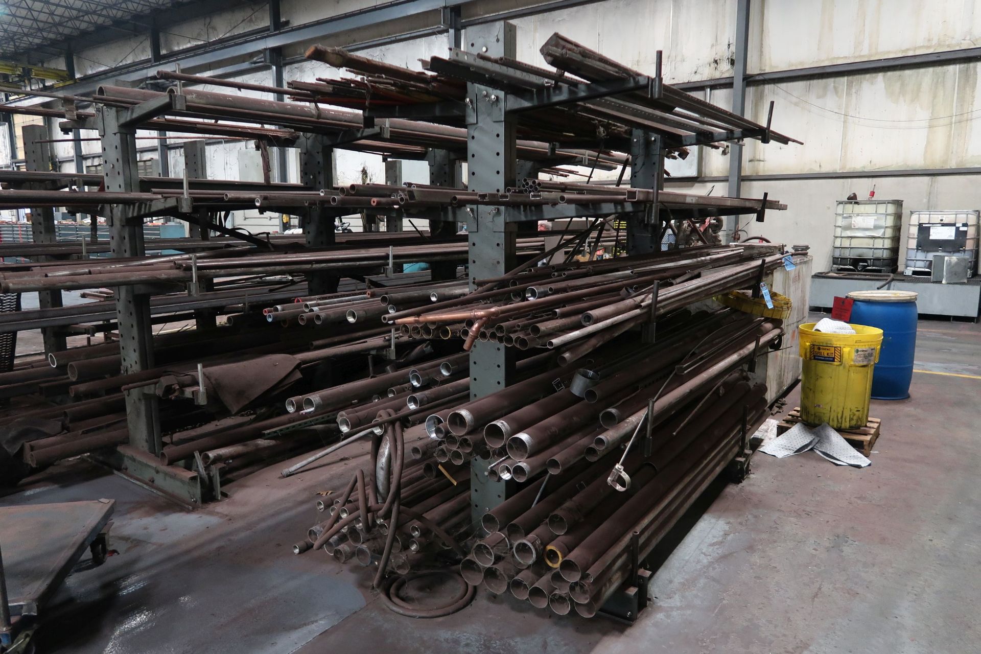 (LOT) 24" ARM DOUBLE SIDED CANTILEVER RACK WITH CONTENTS - PIPE AND OTHER STRUCTURAL **LOADING PRICE