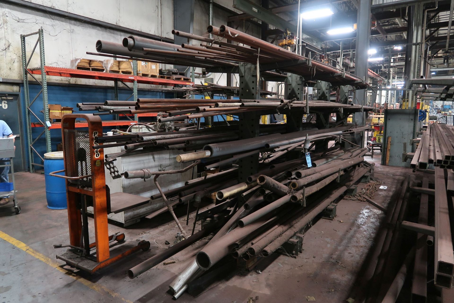(LOT) 24" ARM DOUBLE SIDED CANTILEVER RACK WITH CONTENTS - PIPE AND OTHER STRUCTURAL **LOADING PRICE