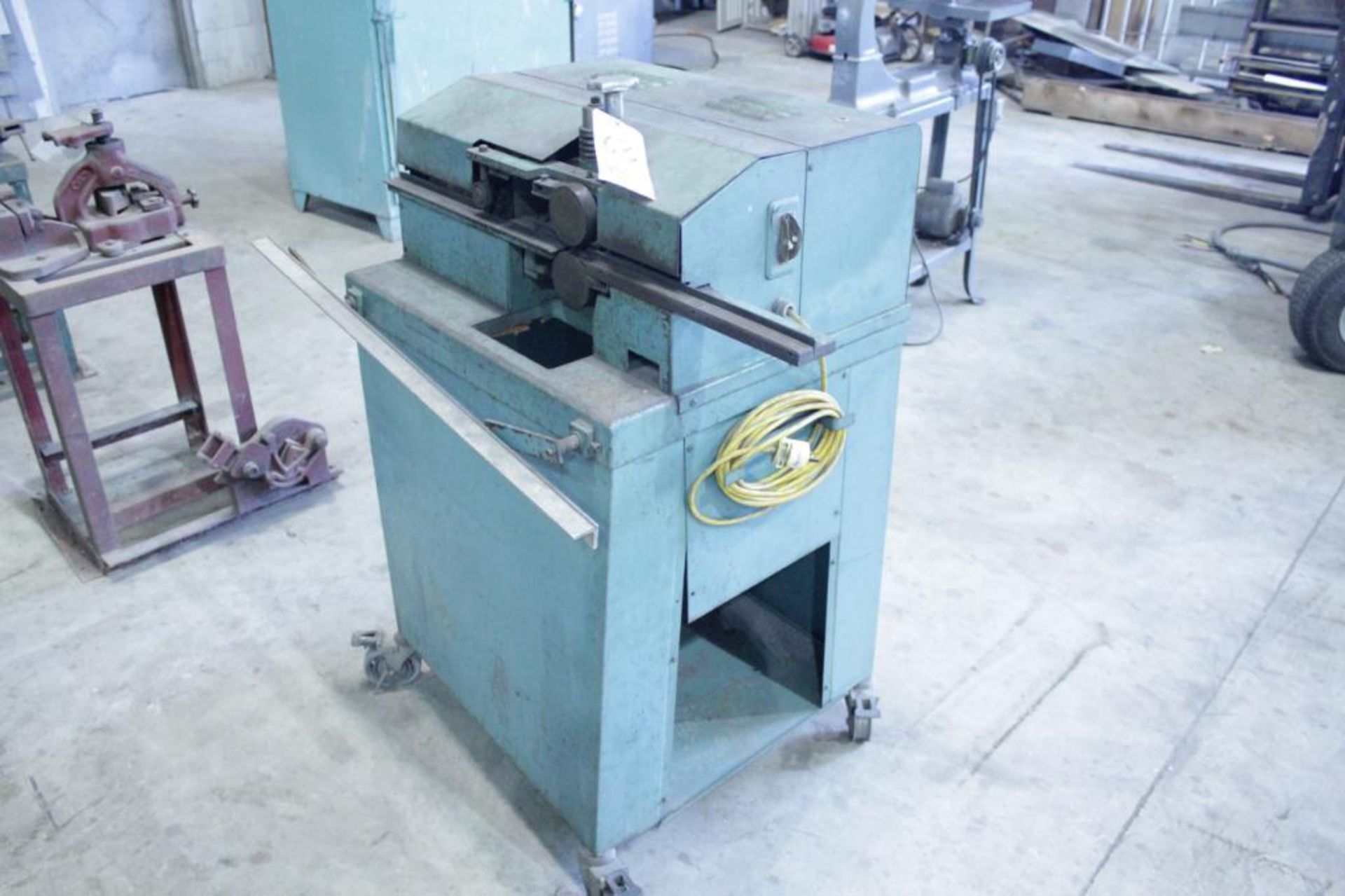 Sheet metal edge deburring machine