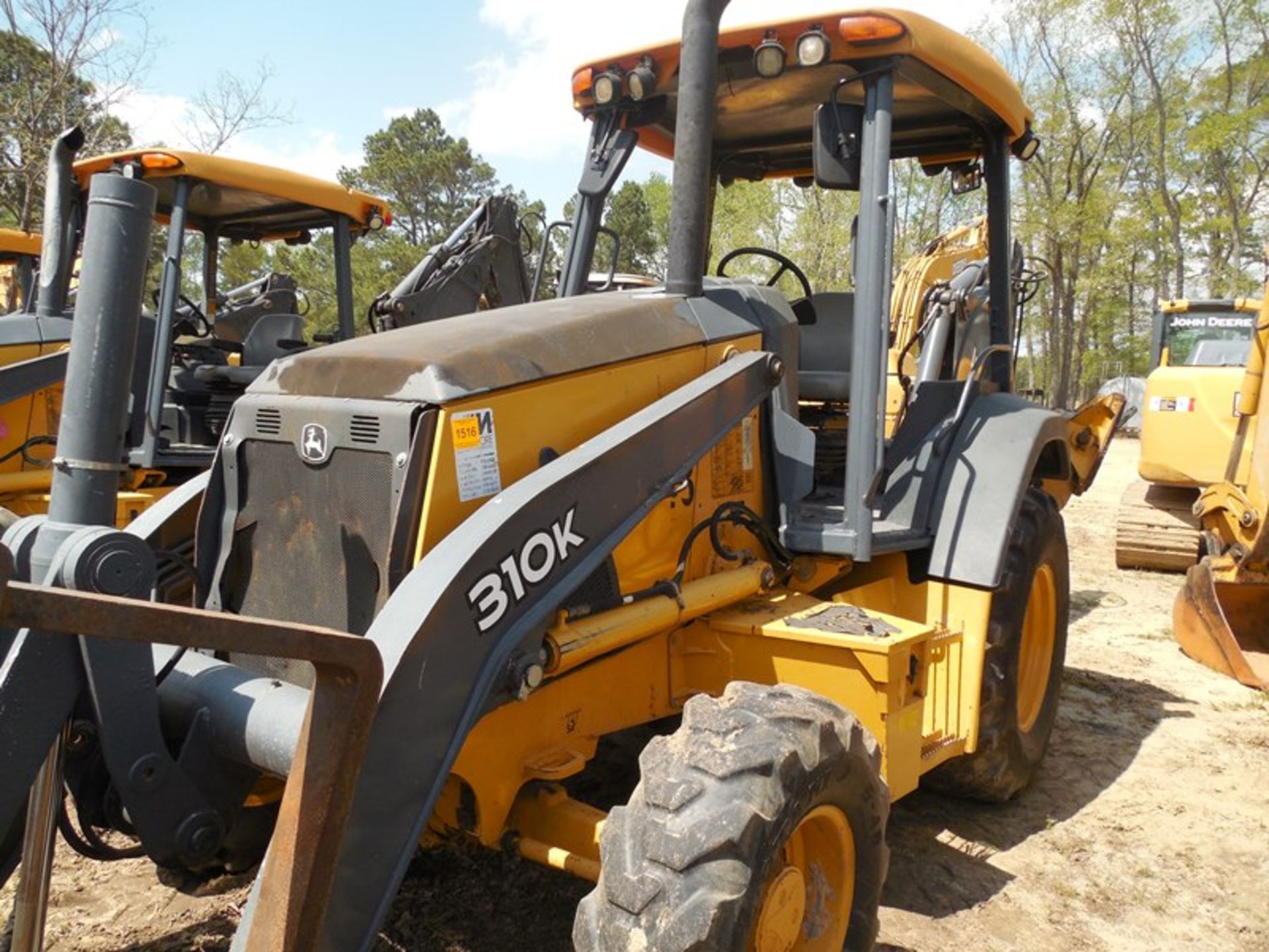 Deere 310K Backhoe 3368 hrs 4wd, Multi purpose bucket w/forks VIN# 1T0310KXPDE246928 4wd, Multi - Image 4 of 8