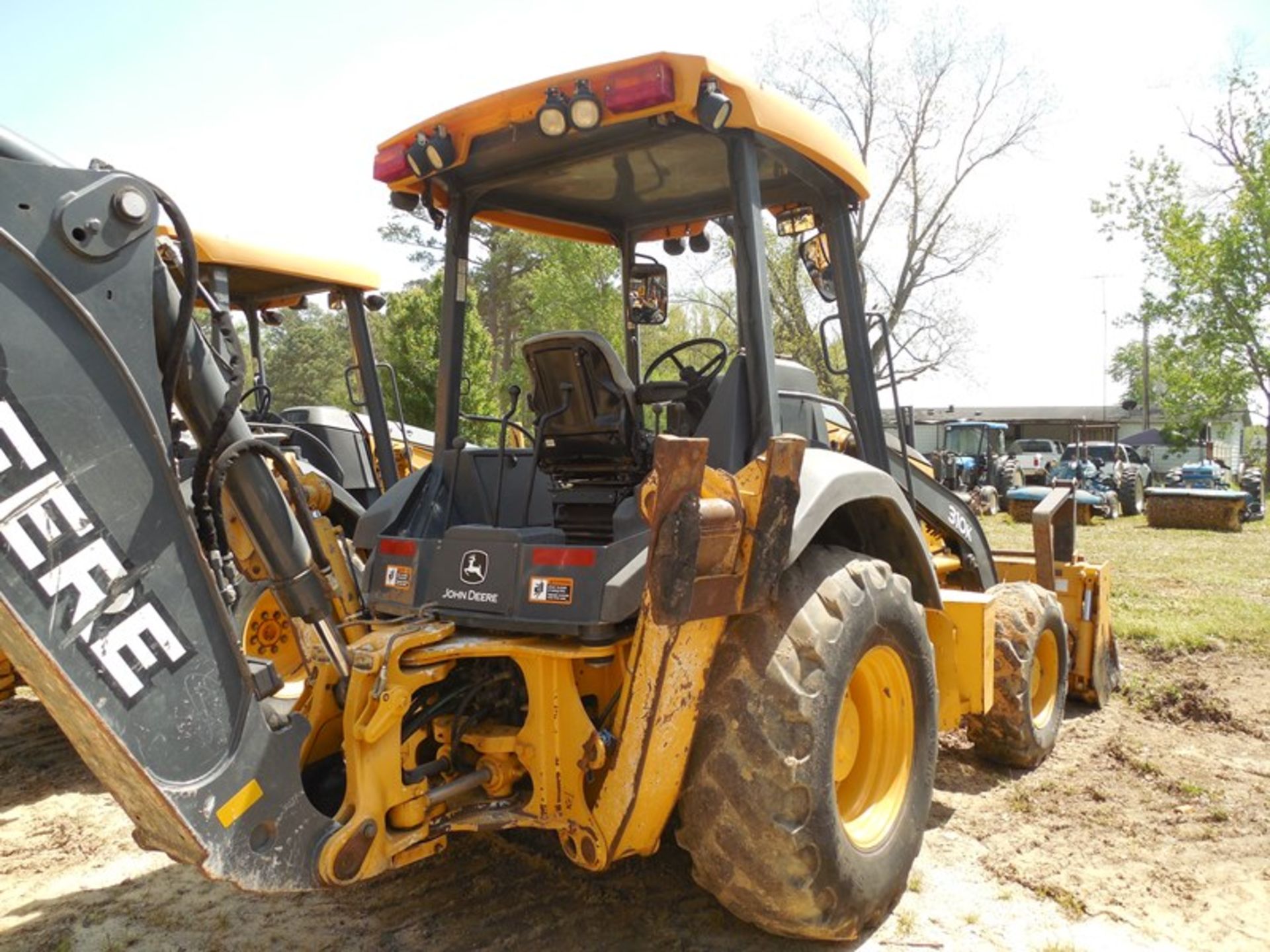 Deere 310K Backhoe 3368 hrs 4wd, Multi purpose bucket w/forks VIN# 1T0310KXPDE246928 4wd, Multi - Image 7 of 8