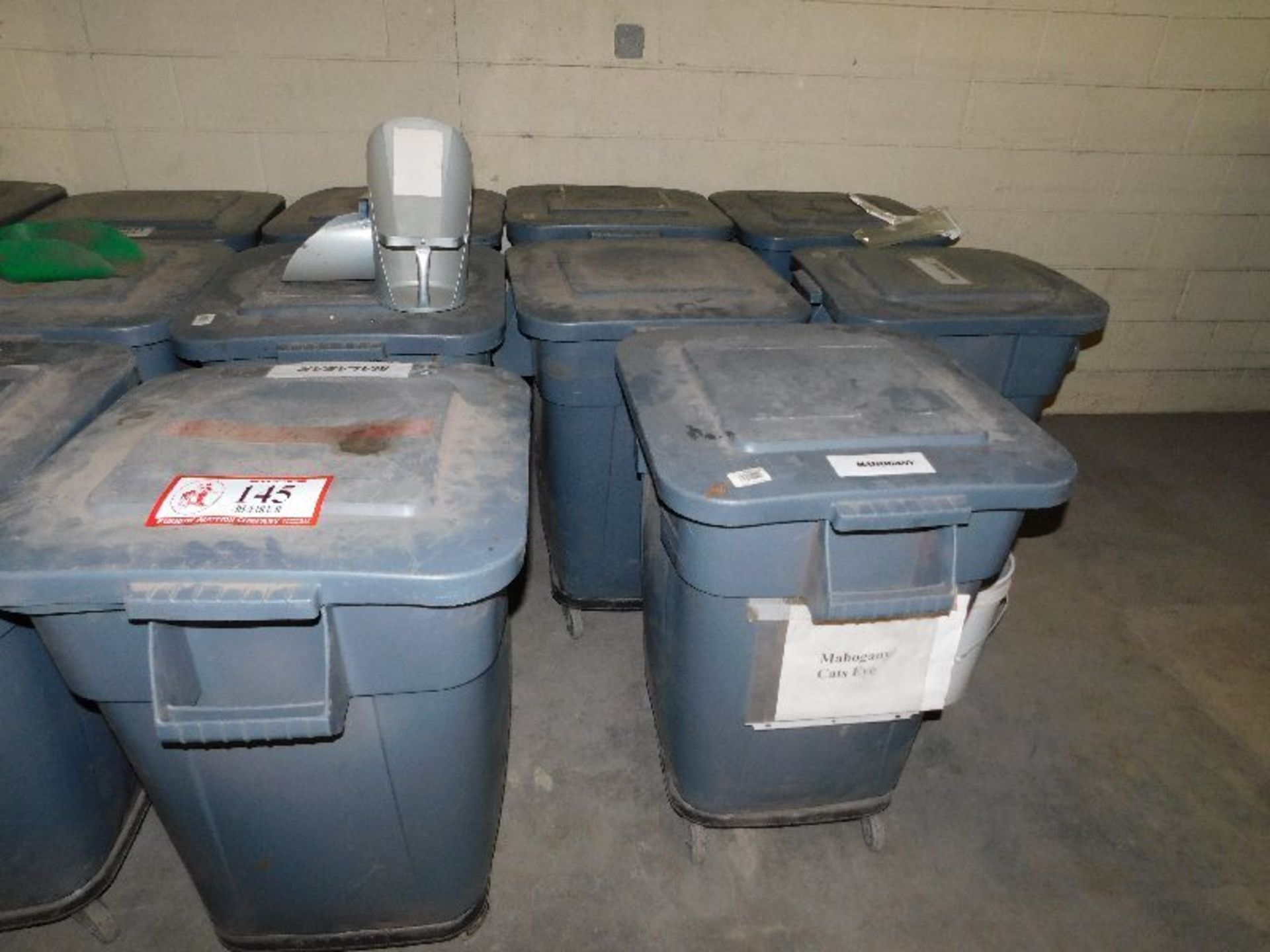 (8) Various Color 35-Gallon Trash Cans, Full of Color Stone, Mahogany, Charcoal, etc.