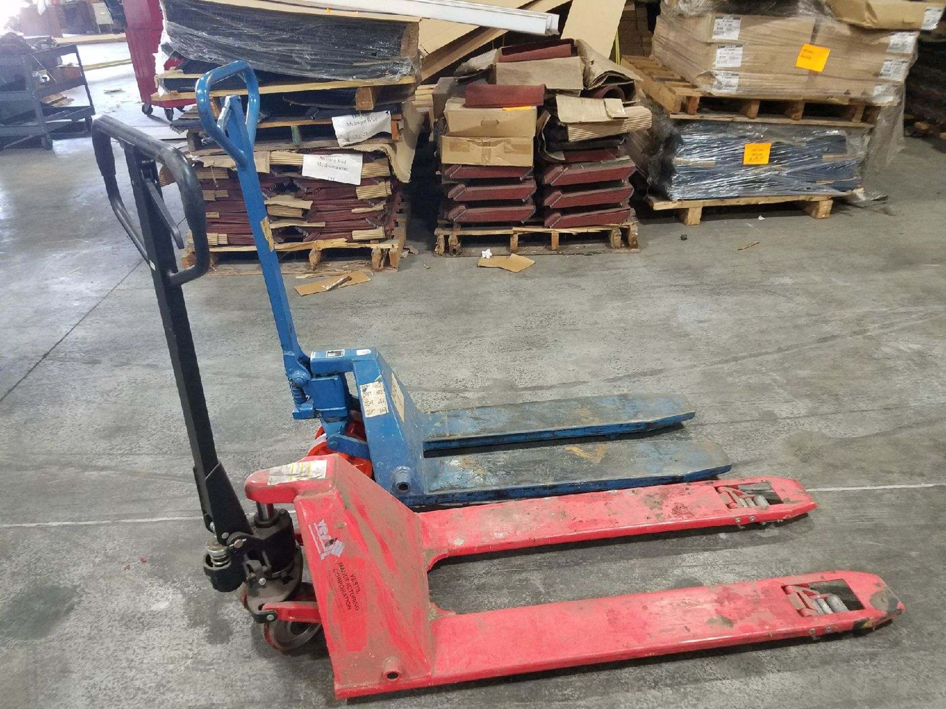 (2) Pallet Jacks-Blue Giant 5500lb Capacity & Vestil Low Profile 2200 capacity