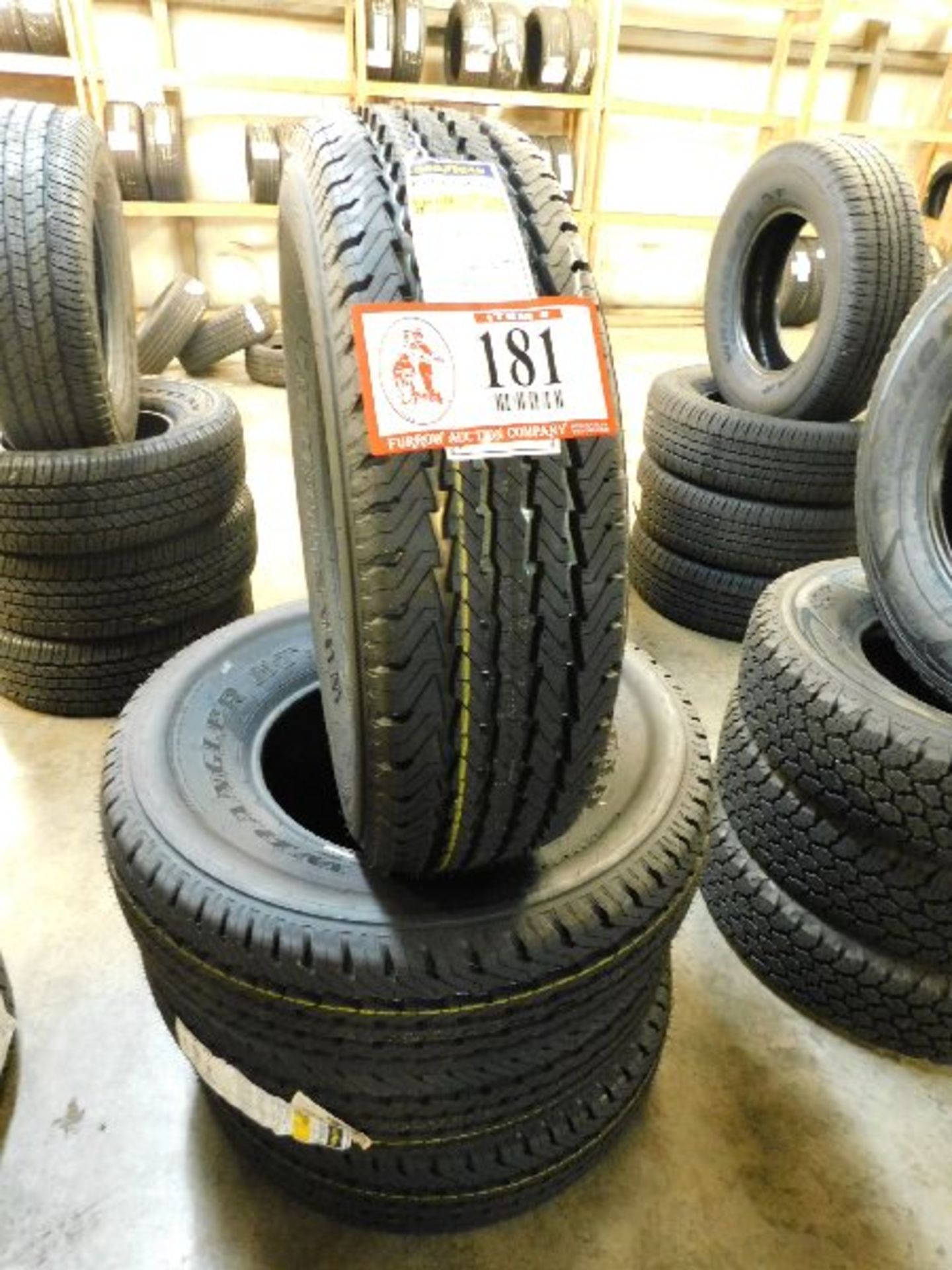 (4) Goodyear Wrangler HT Tires, LT235/85R16 (TAXABLE)