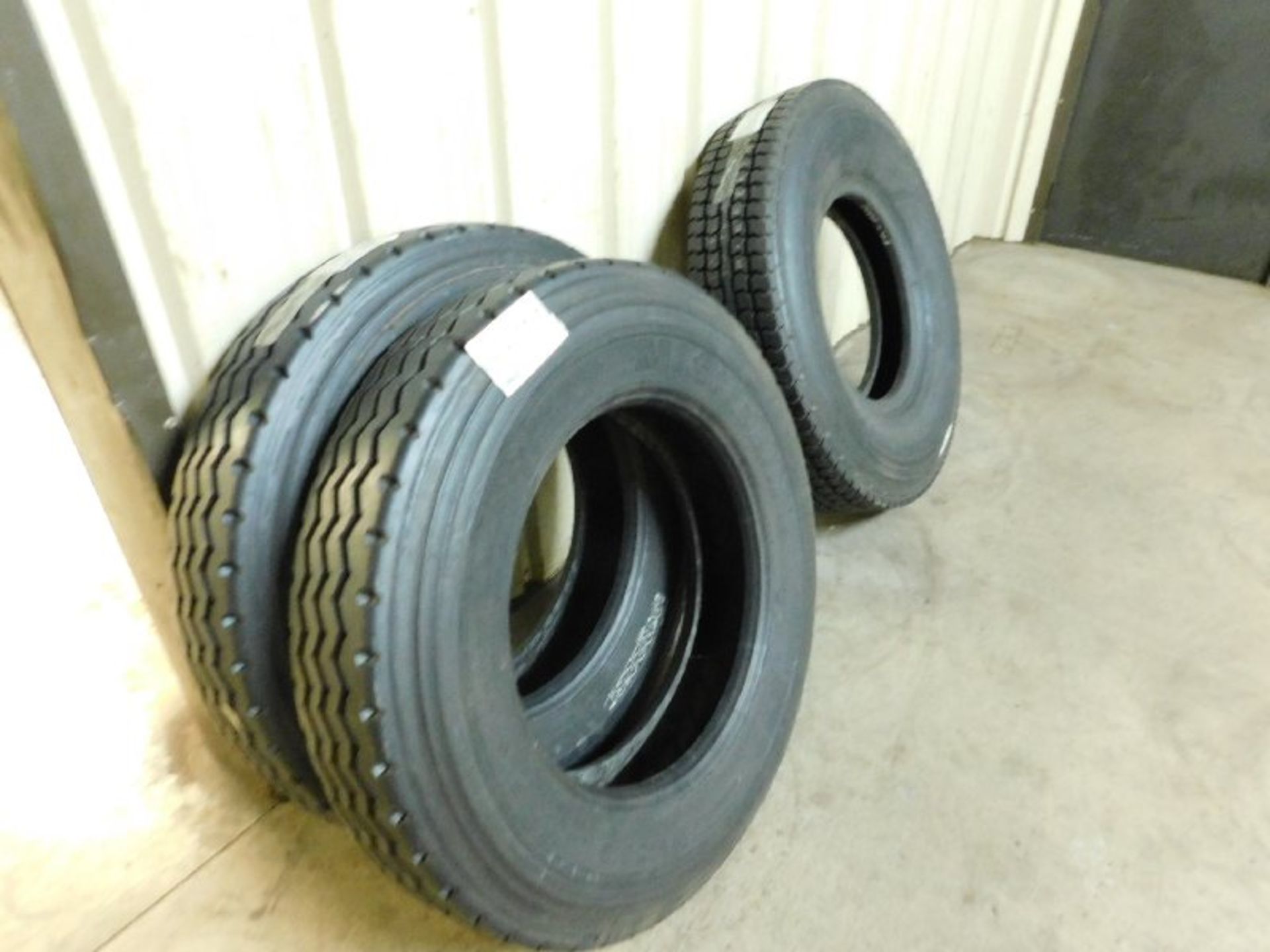 All Truck Tires in Room Used and Retread, Assorted Size and Types, (2) 9R22.5 Retreads, (1) 10.00R20