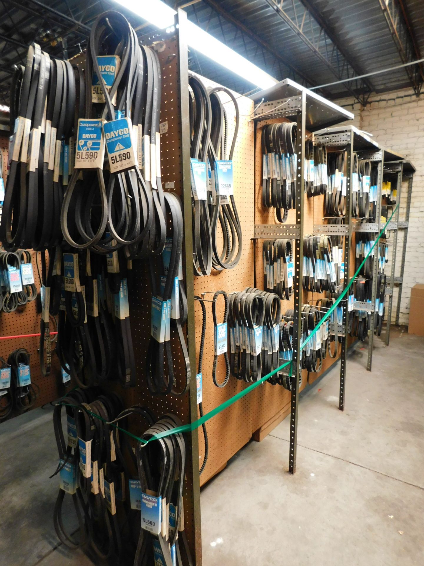 Contents of (5) Sections Shelving, Both Sides, Large Quantity of V-Belts by Dayco