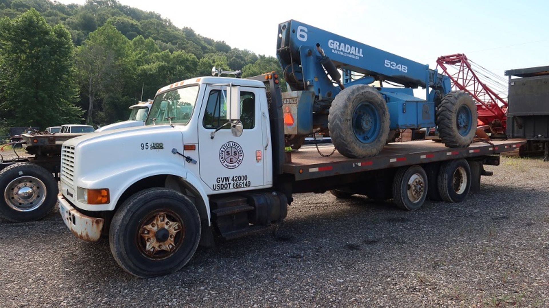 International 4700 4x2 Flatbed Truck (1995) Mileage: 188,804, VIN: 1HTSCAAN4SH667919