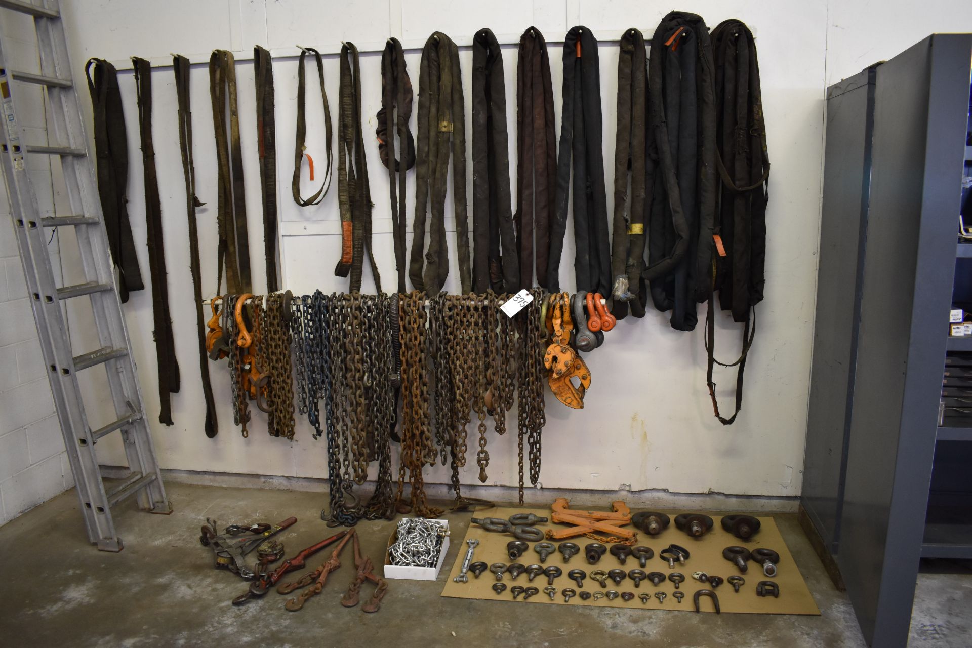 LOT: ASSORTED RIGGING EQUIPMENT, INCLUDING: Chains; Grabs; Eye Bolts; Hand Operated Lever Hoists;