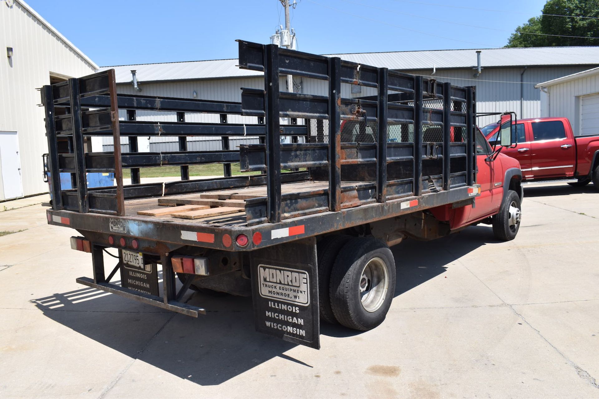 2005 GMC 3500 Single-Axle Stake Bed Truck, VIN 1GDJC34UX5E344645, 12 ft. (approx.) Bed, Vortec 6. - Image 5 of 10