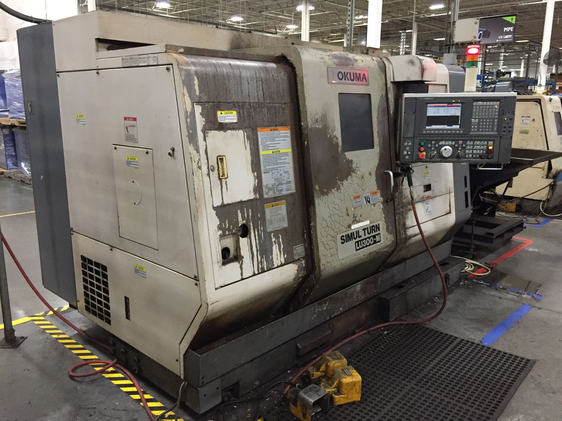 OKUMA LU300-M SIMULTURN 5 AXIS LIVE TOOL CNC LATHE (2004)