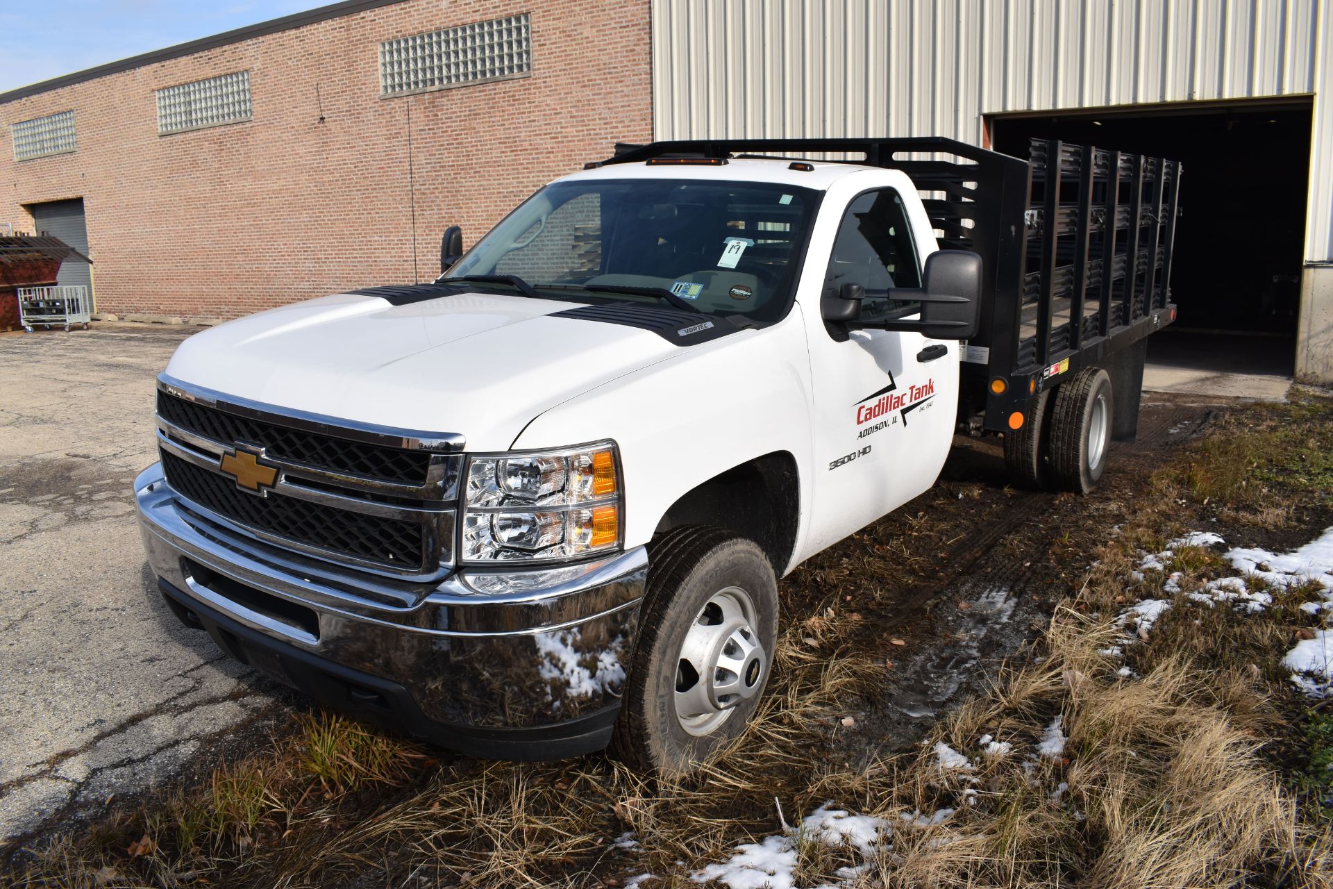 2012 Chevrolet Model 3500 HD Single-Axle Gas Stake Bed Truck, VIN 1GB3CZCG3CF166651, 16,252 miles,