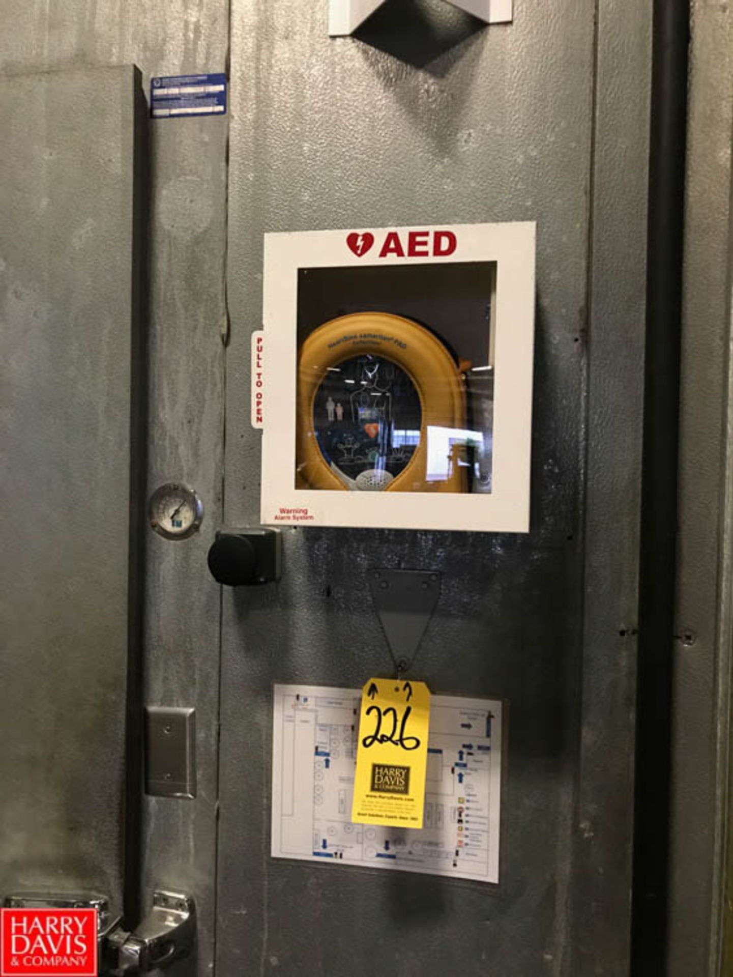 Defribrillator with AED Cabinet Rigging Fee: 25