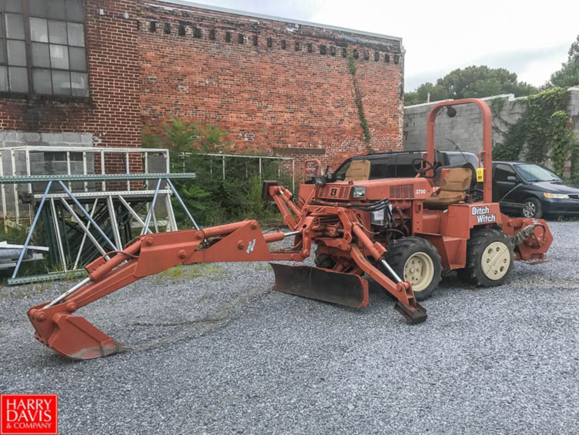 Ditch Witch Trencher Model 3700 with Bucket and Blade Attachment Rigging Fee: $ 25