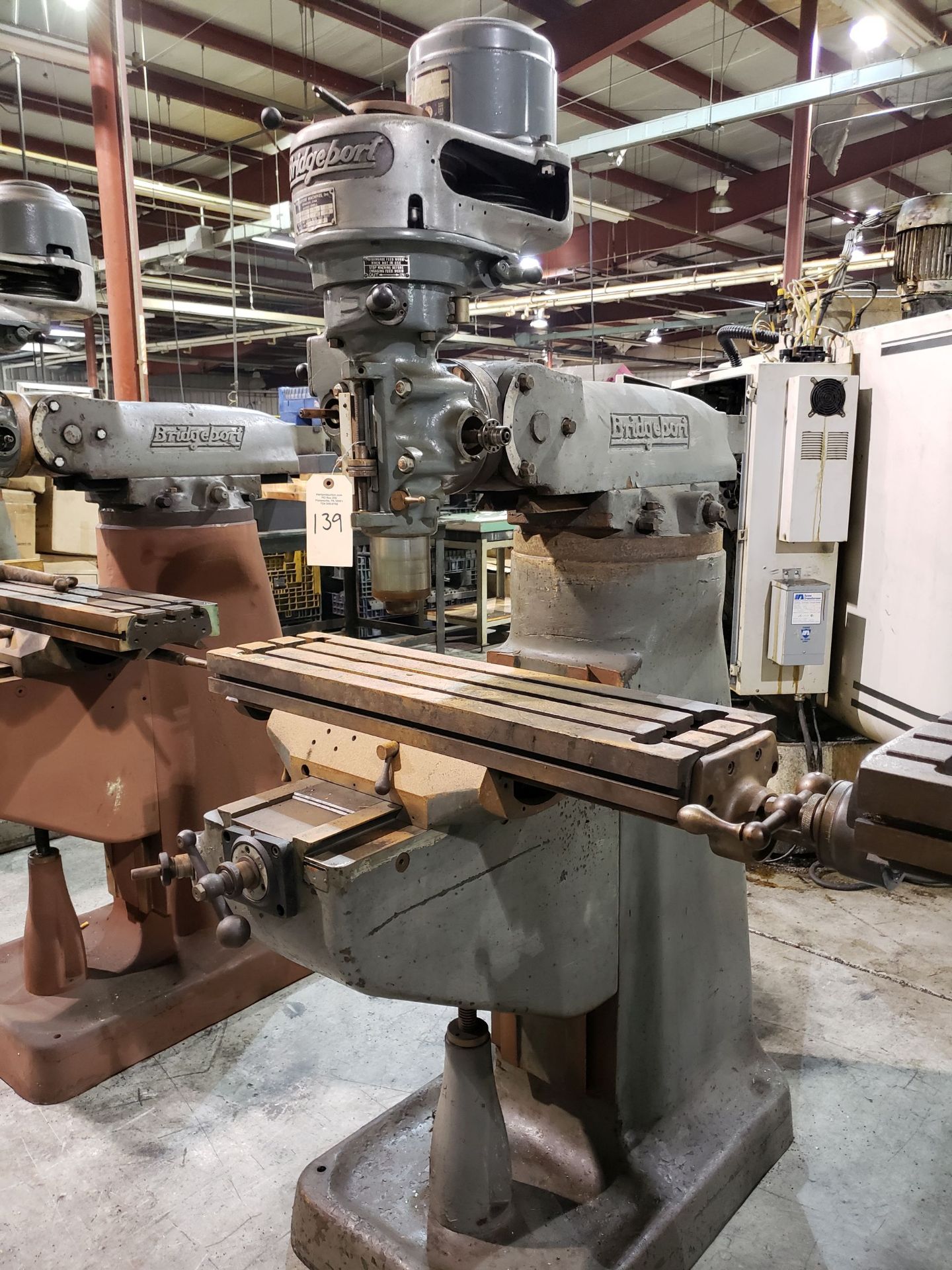 BRIDGEPORT VERT MILL 9X36 TABLE SN 145088