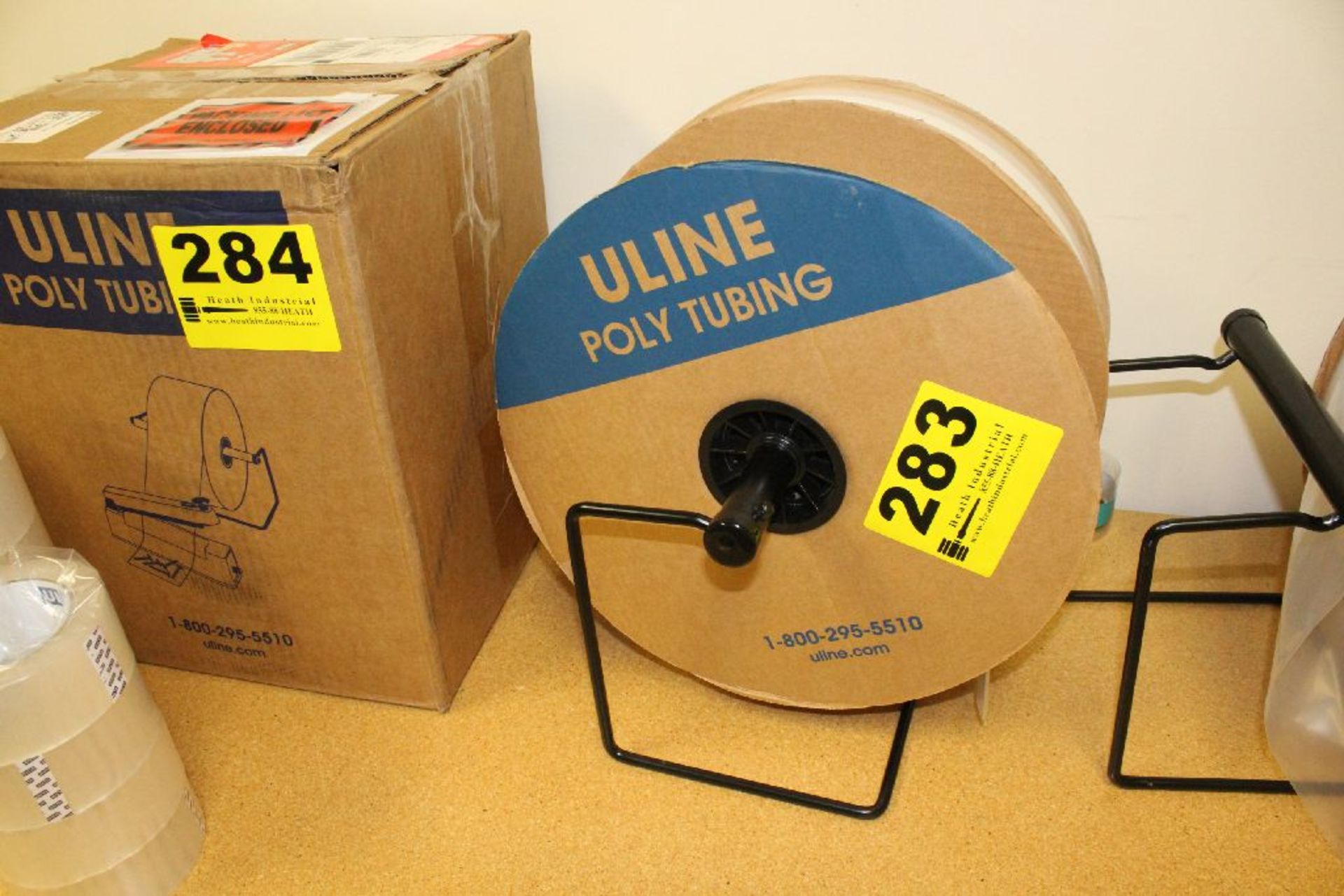 LOT OF ULINE 4" 4-MIL POLY TUBING AND 2" 4-MIL POLY TUBING WITH STAND