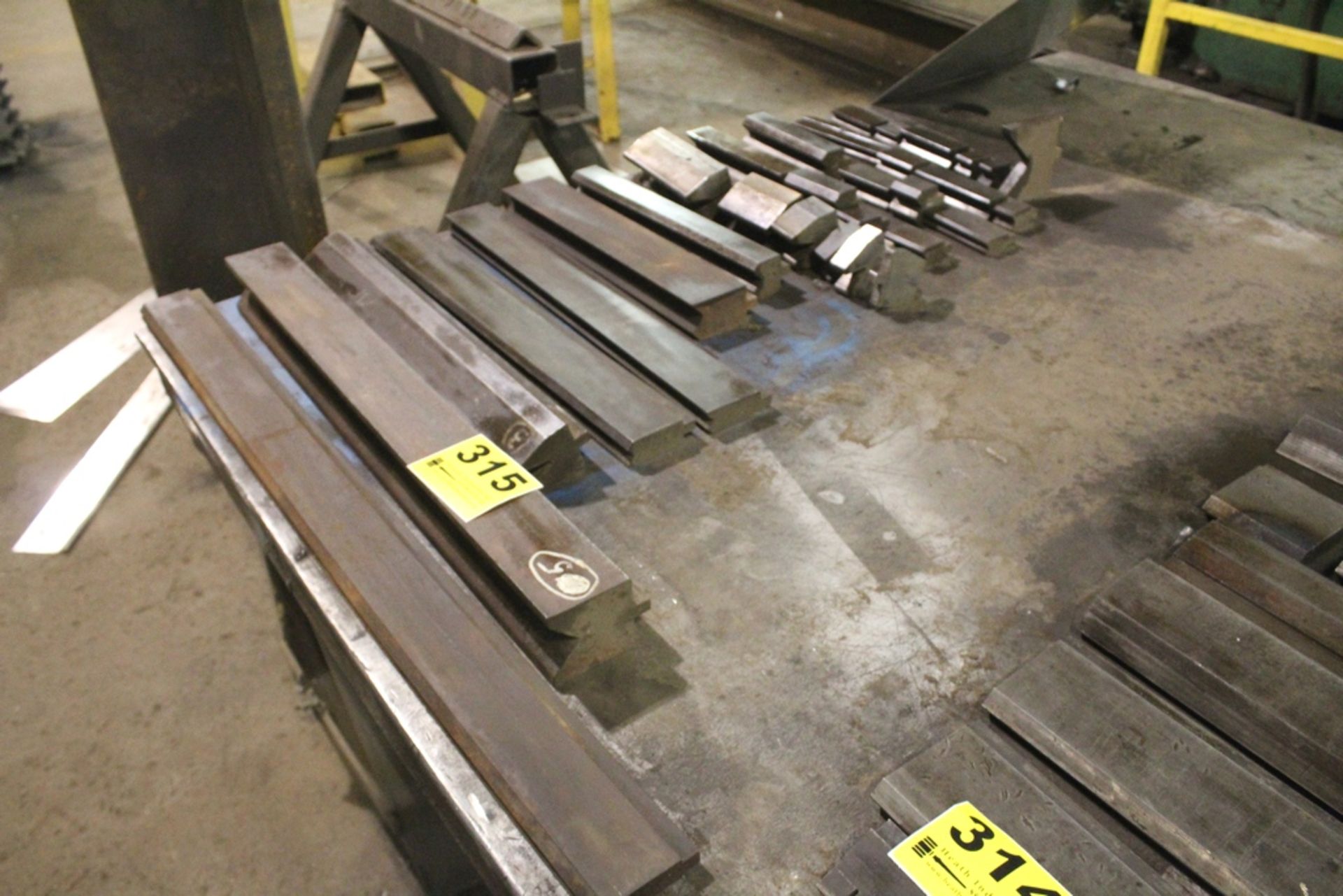 ASSORTED FEMALE PRESS BRAKE DIES ON TABLE