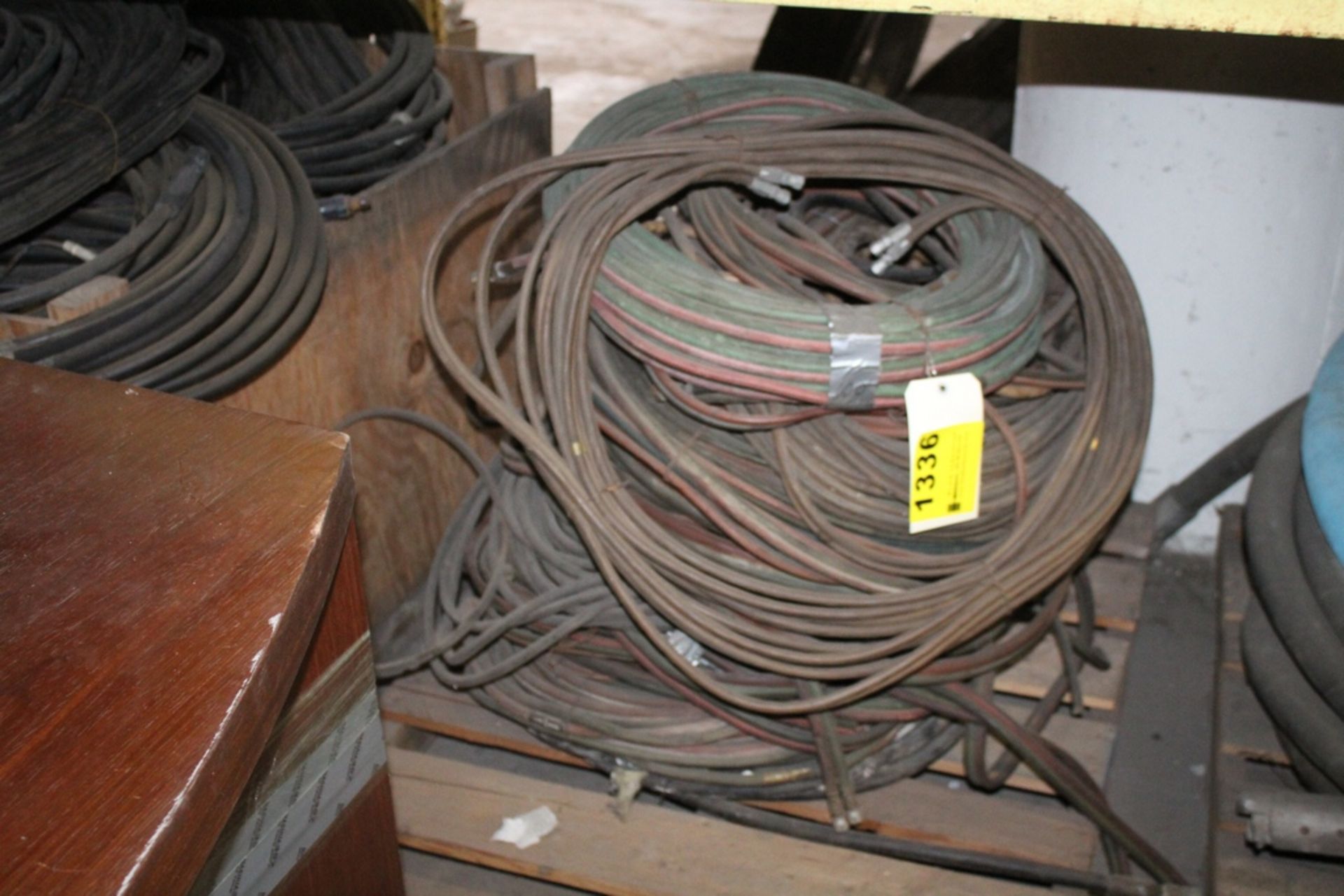 LARGE QTY OF WELDING HOSE ON SKID