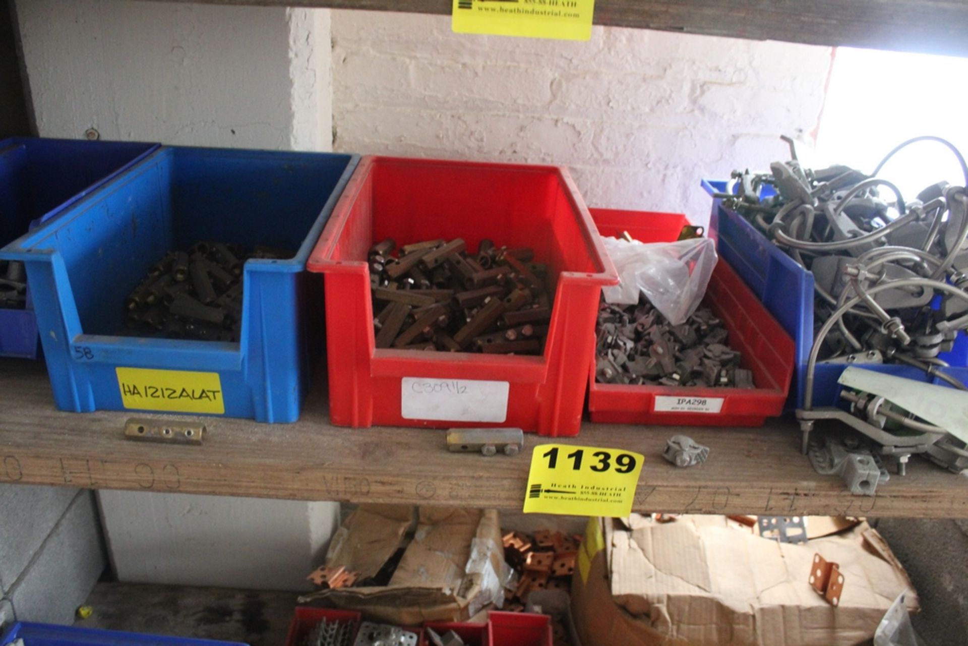 LARGE QTY OF LIGHTENING ROD HARDWARE ON SHELF