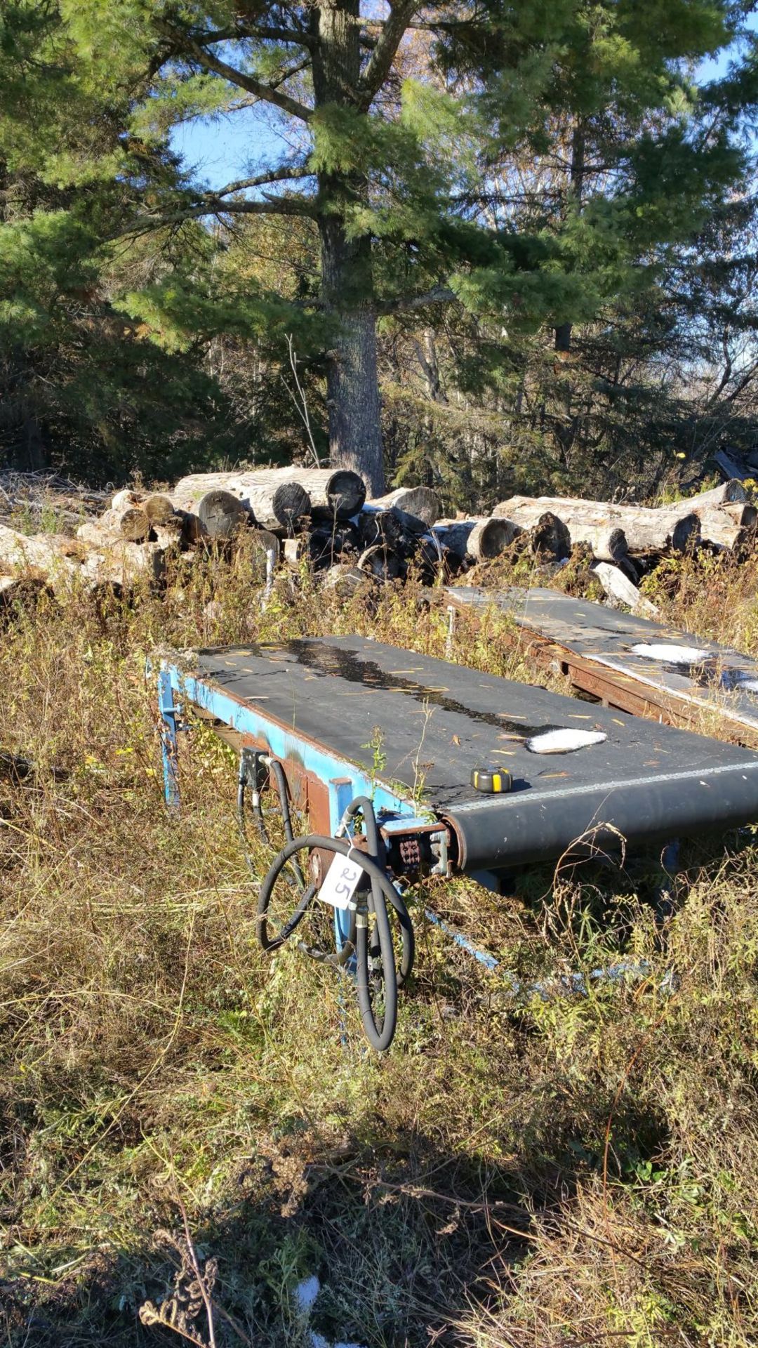 36"x9' hydraulic drive board conveyor.