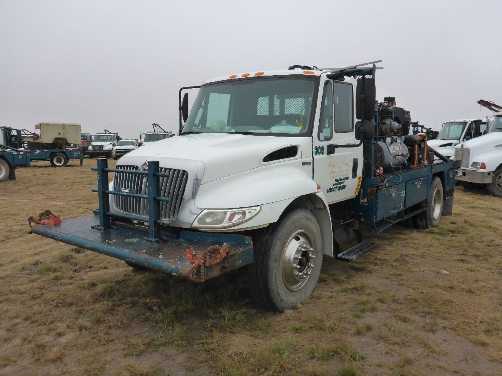 2011 International Model 4300 2 Ton Diesel Gang Truck