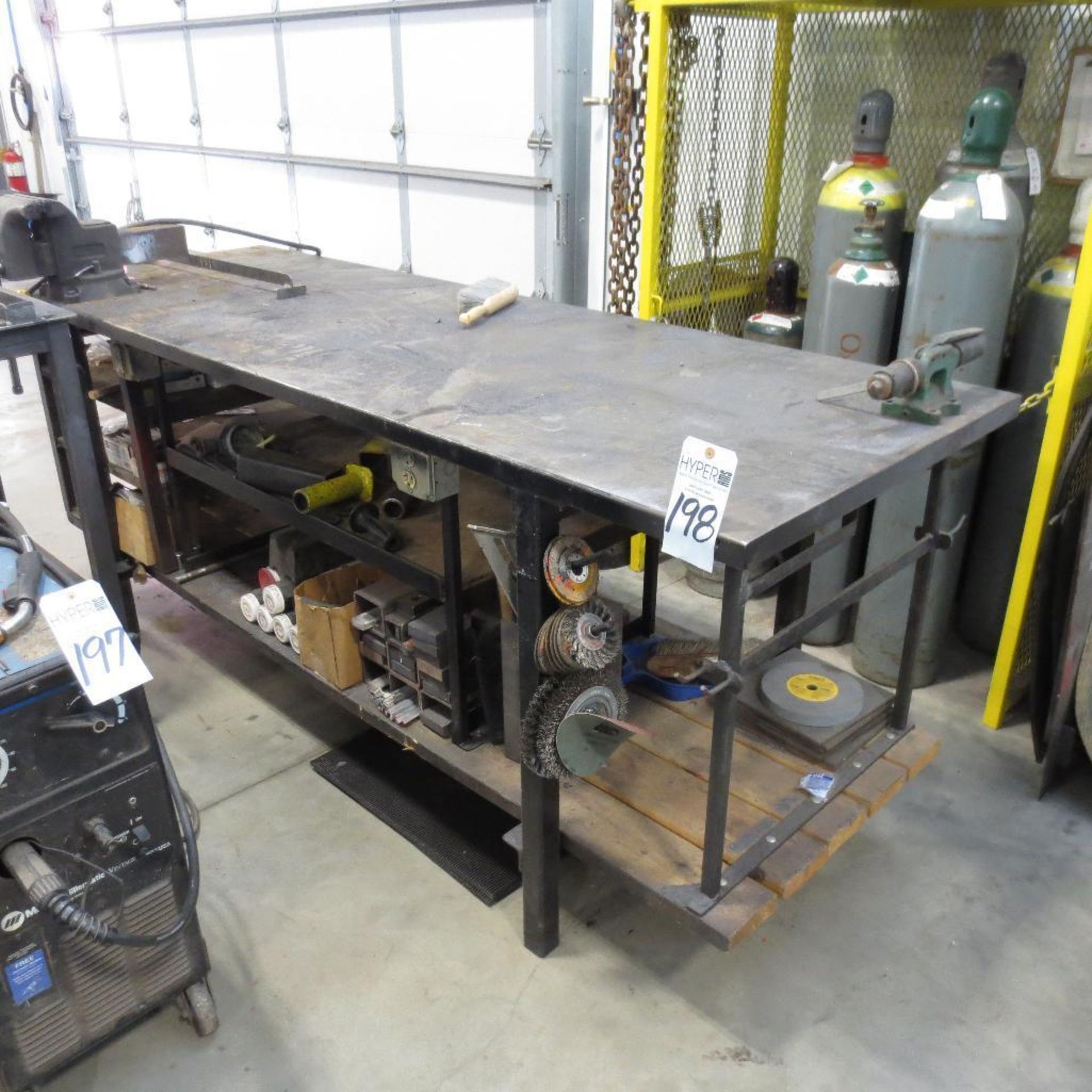96 1/2" X 33" Steel Table with Vise