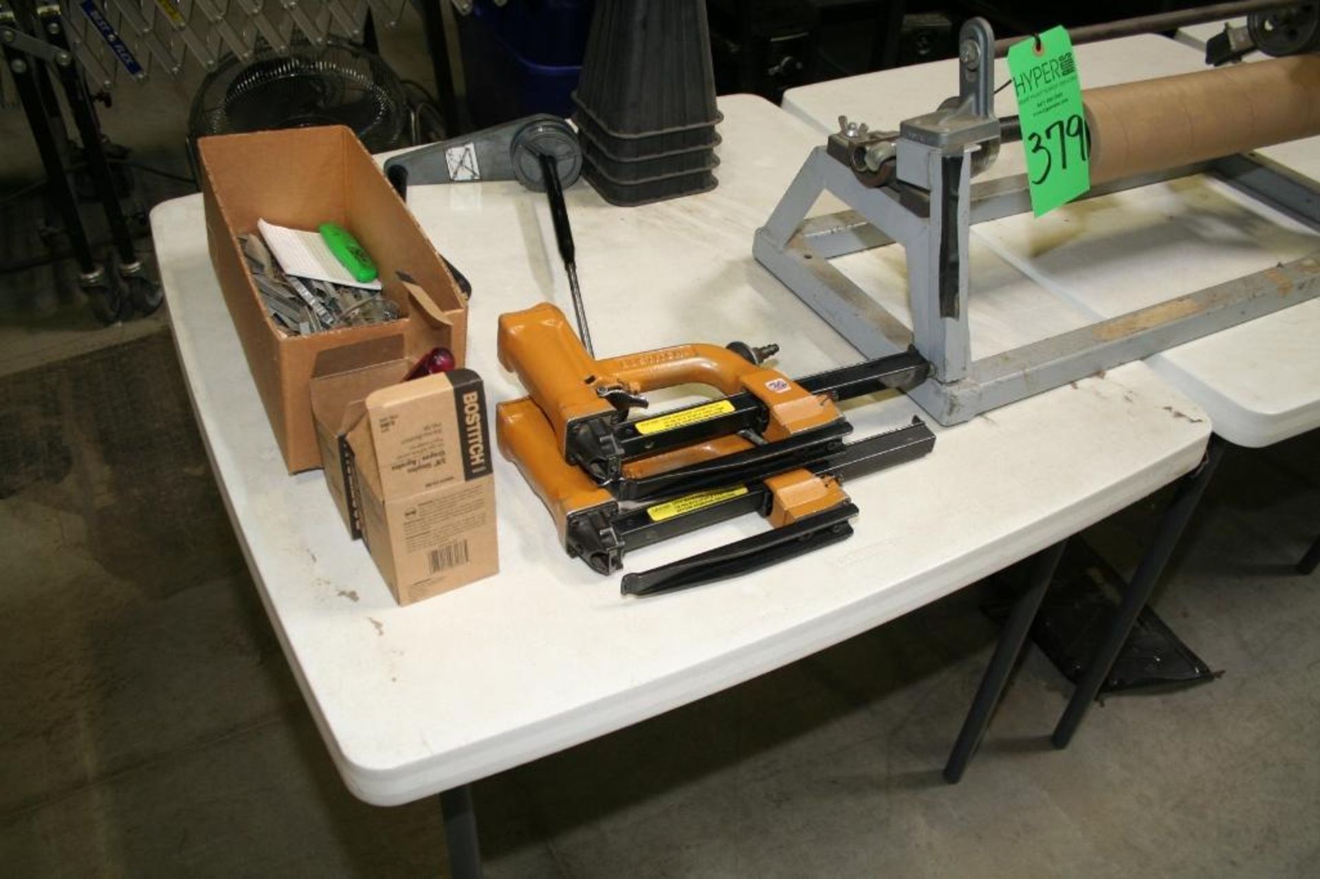 (3) Folding Tables 3'x3', (1) Wood Rolling Cart 2'x4', (2) Air Staplers, 24" Roll Measurer, and Misc - Image 2 of 4