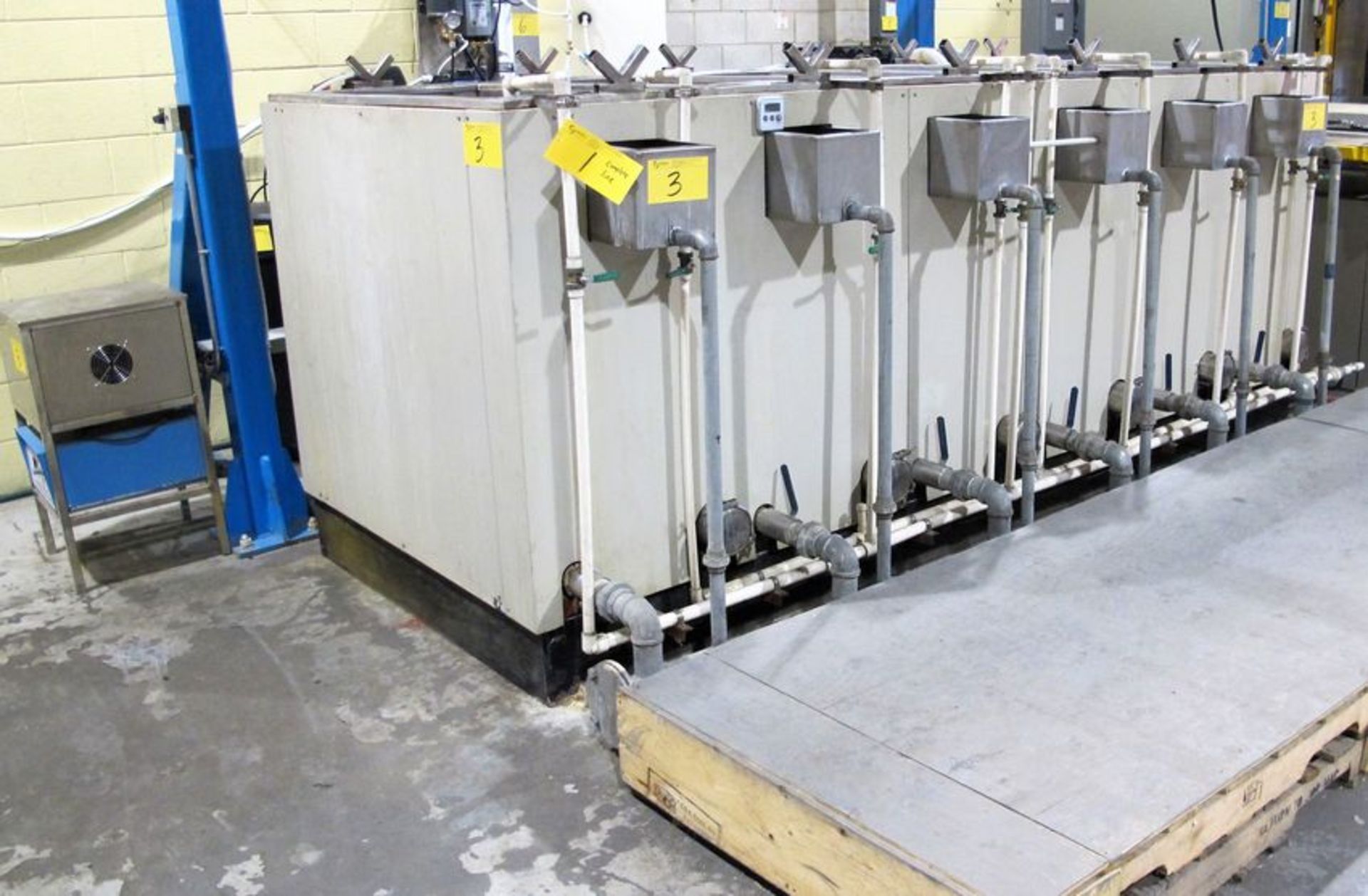 2015 APPROX. 132"L X 54"W X 54"H STAINLESS STEEL DIP TANK SYSTEM W/ (6) PARTITIONS - EACH 19.25"W