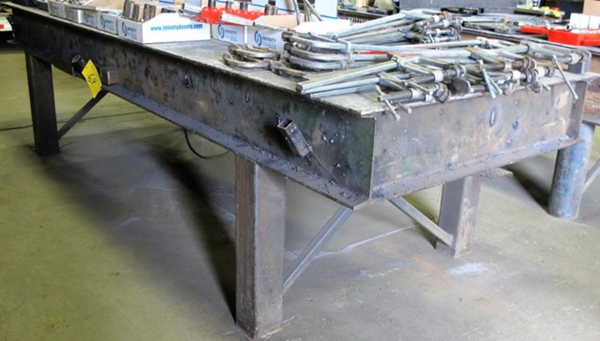 STEEL WELDING TABLE (12'L X 4'W X 3'T) NO CONTENTS