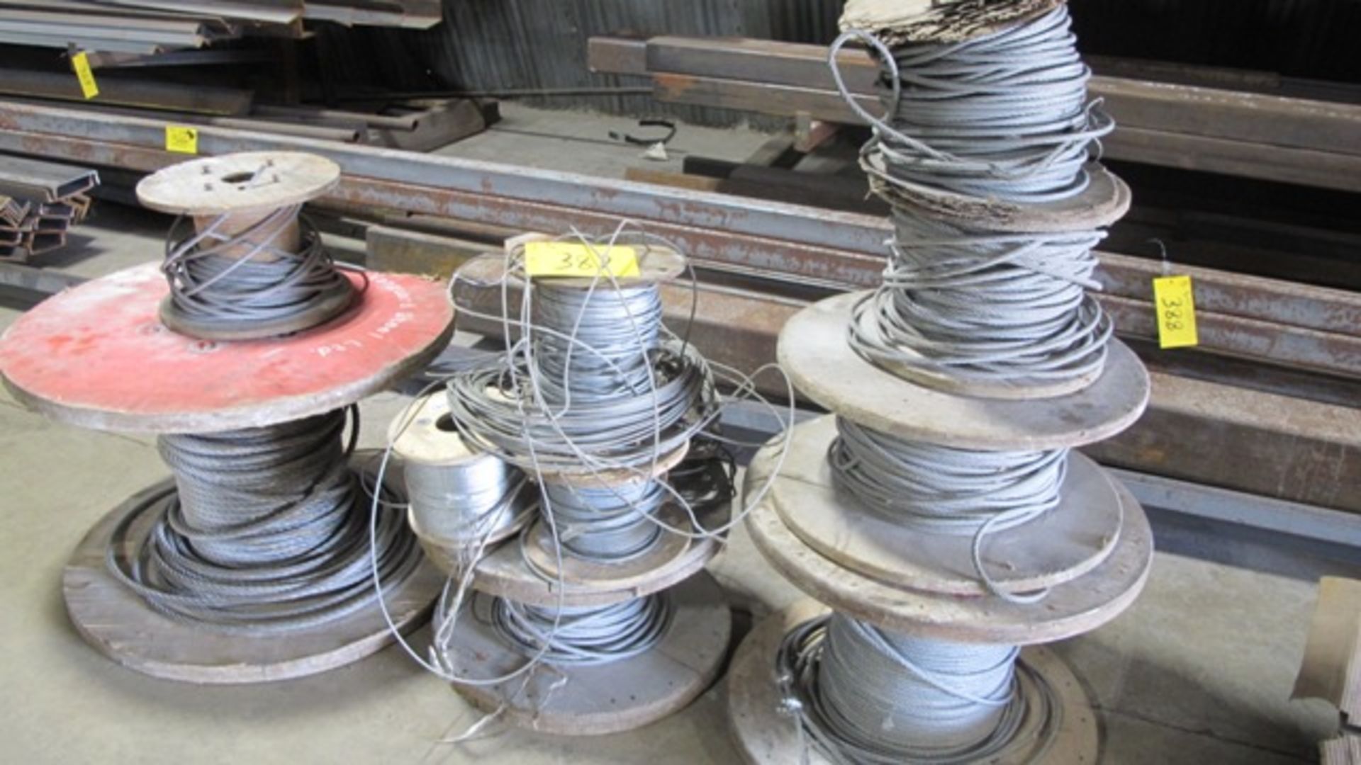 LOT OF (11) SPOOLS OF STEEL CABLES