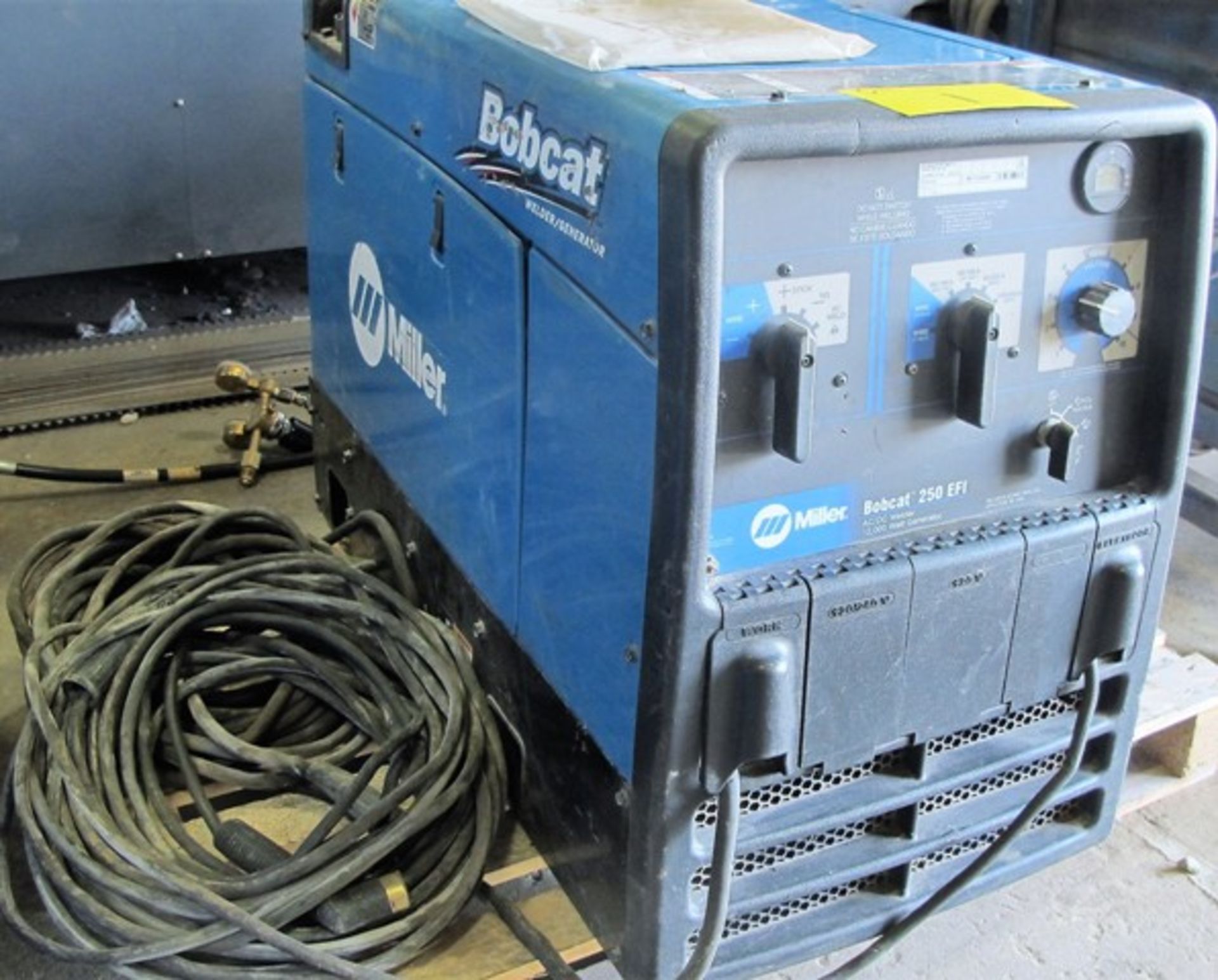 MILLER BOBCAT, 250 EFI, AC/DC WELDER, 12000 VOLT GENERATOR, GAS POWERED, S/N MF110848R W/CABLES