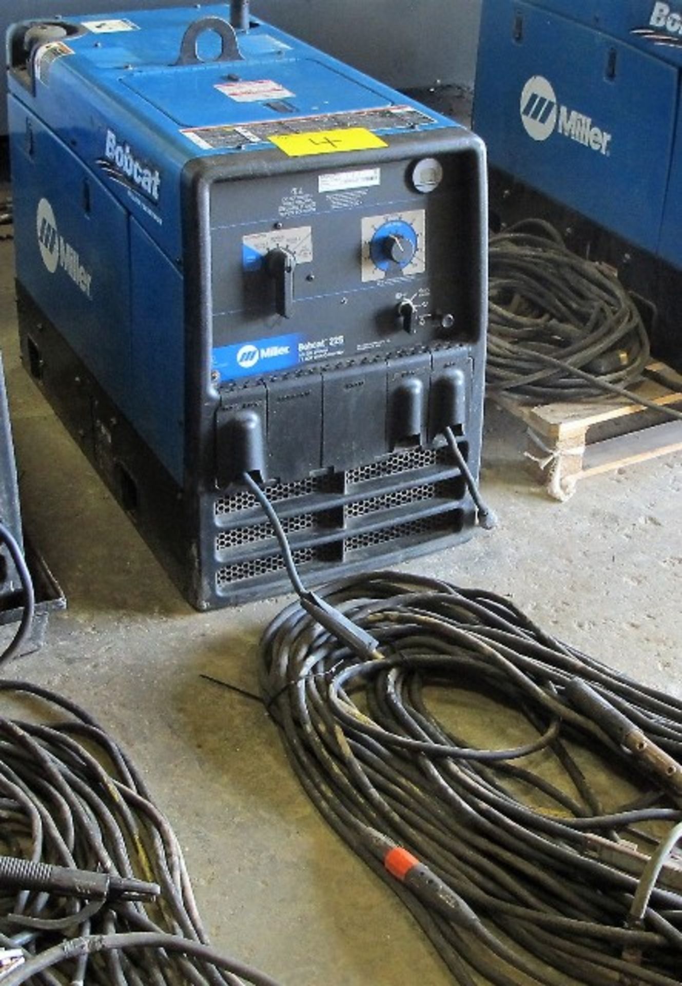 MILLER BOBCAT, 225, AC/DC WELDER, 11000 VOLT GENERATOR, GAS POWERED, S/N ME260255R W/CABLES