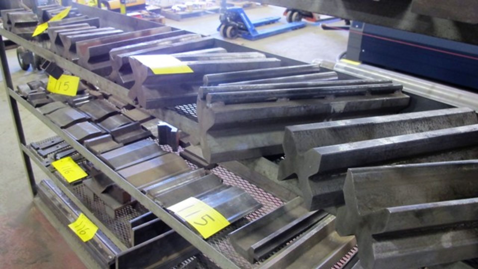 LOT OF APPROX. (18) 4 WAY PRESS BRAKE DIES UP TO 20"L, (1) SHELF ON RACK