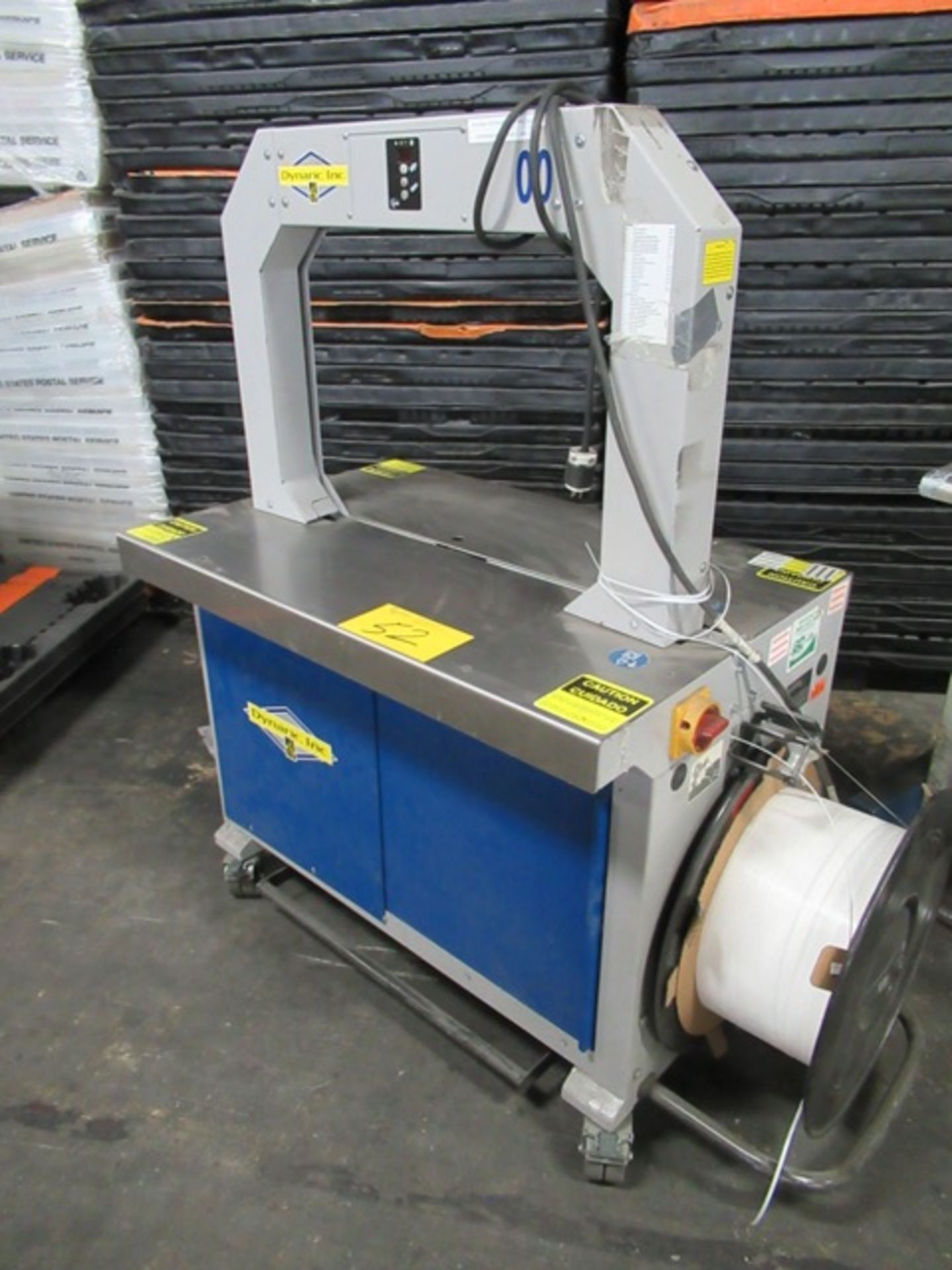 2007 DYNARIC INC. D-2400 ELEC. PLASTIC STRAPPING MACHINE, S/N 111AO30743011