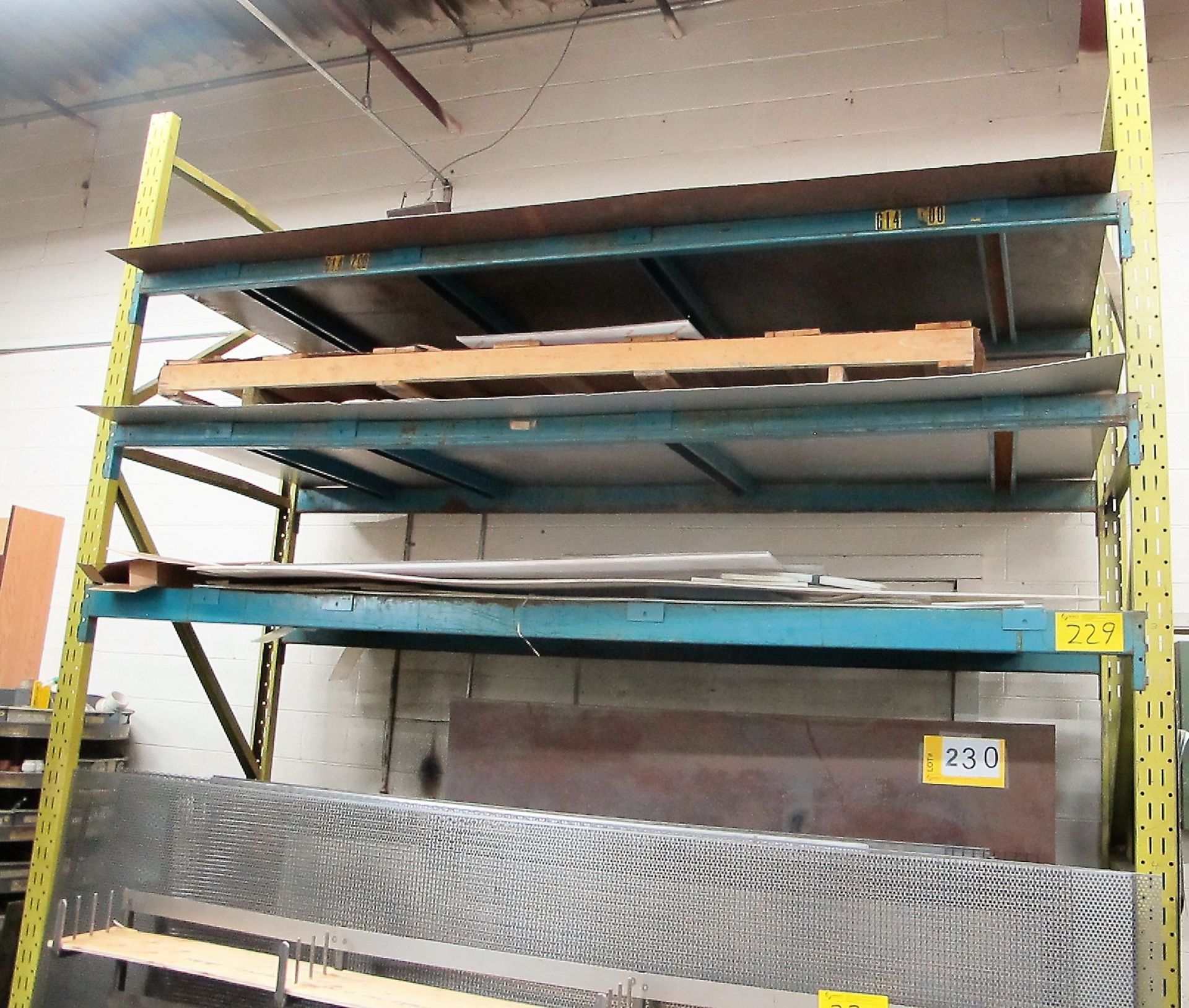 1 SECTION OF PALLET RACKING, APPROX. 42"D X 10'L X 10'T W/PLASTIC SHEETS STOCK