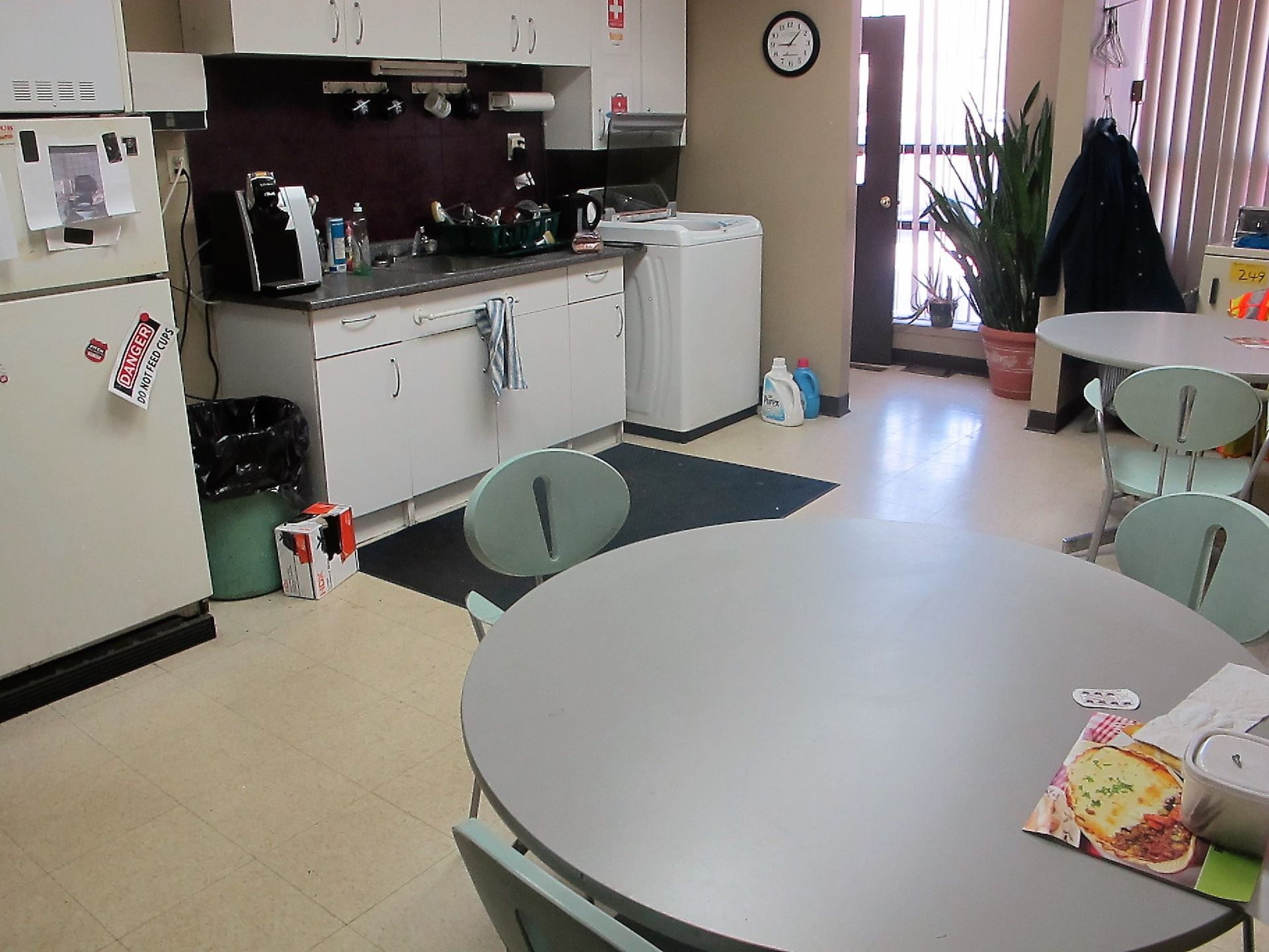 CONTENTS OF KITCHEN INCL FRIDGE, MICROWAVE WASH, DRYER, 2 TABLES AND CHAIRS (NO COFFEE MACHINE)