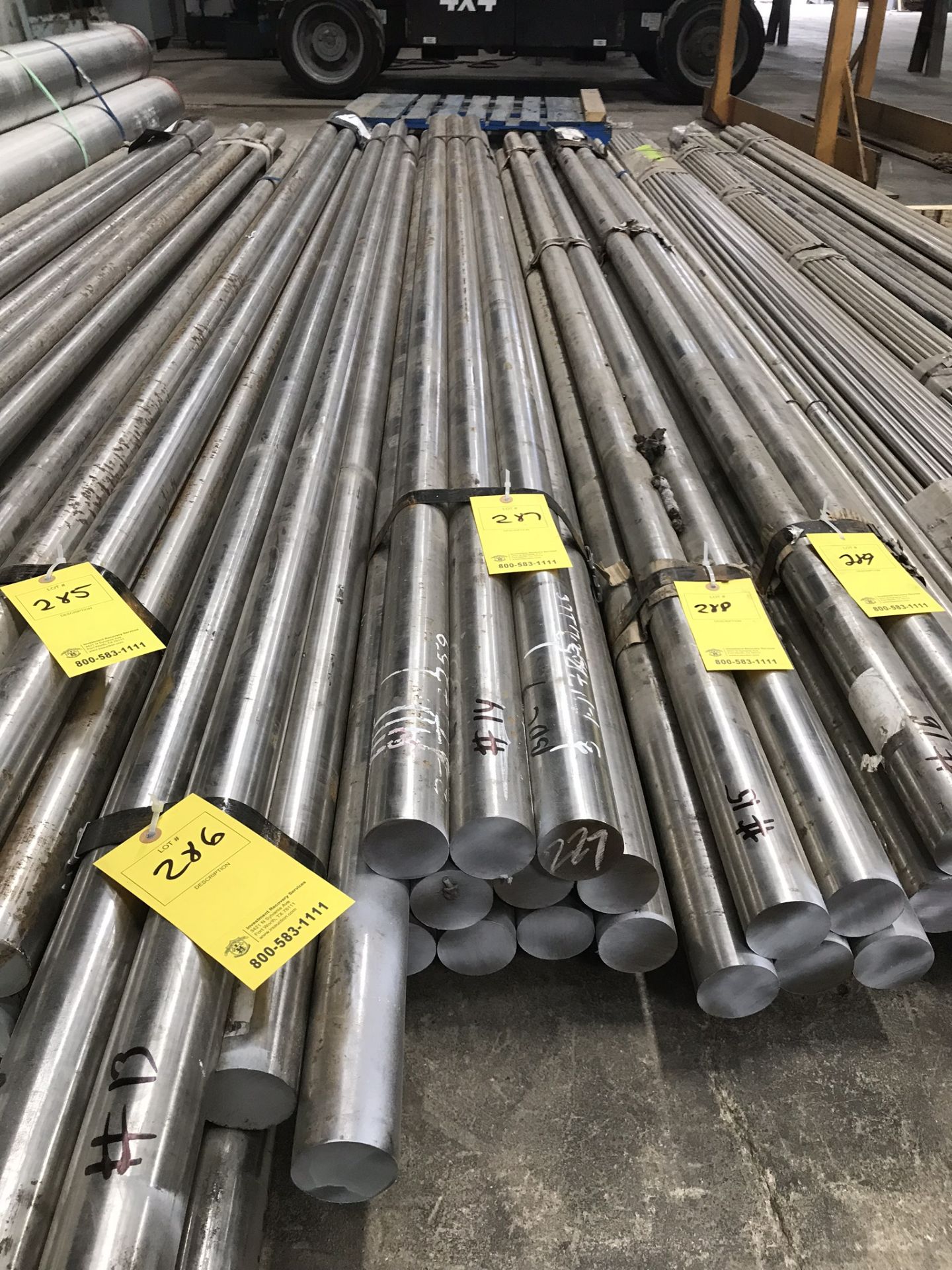 303 STAINLESS STEEL SOLID MATERIAL, APPROX 1,832 LBS, (11) 12' X 2 1/4" (LOCATION 3: 3421 N