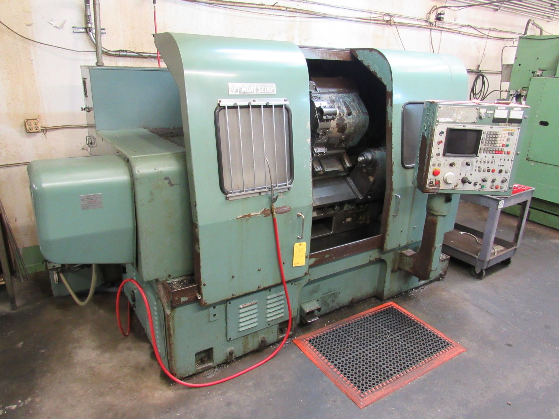 Mori Seiki SL-4A CNC Lathe, new 1987, 20” swing, 22” centers, 11” hyd. 3-jaw chuck, single turret w/ - Image 2 of 16