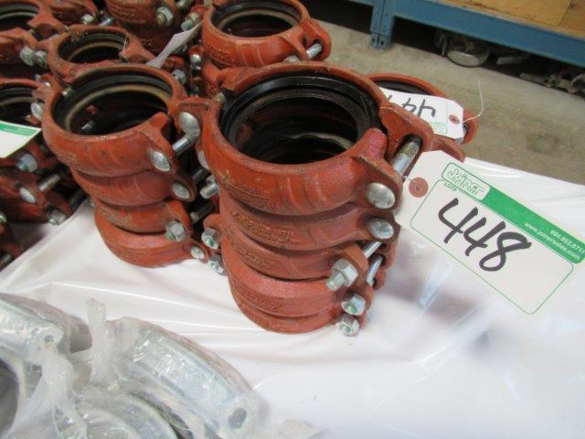LOT OF VICTAULIC PIPE CLAMPS