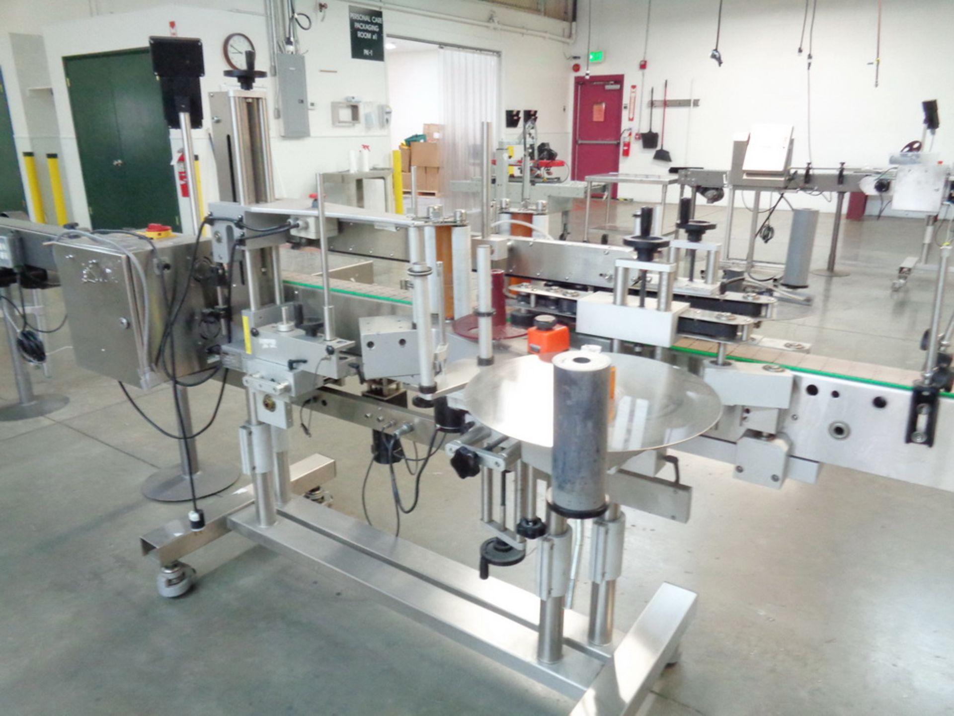 BULK LOT- CREAM PACKAGING LINE #2 (LOCATED IN CLEAN ROOM #2 DESIGNATED CL-2) UP TO (40) BOTTLES/MIN - Image 28 of 32