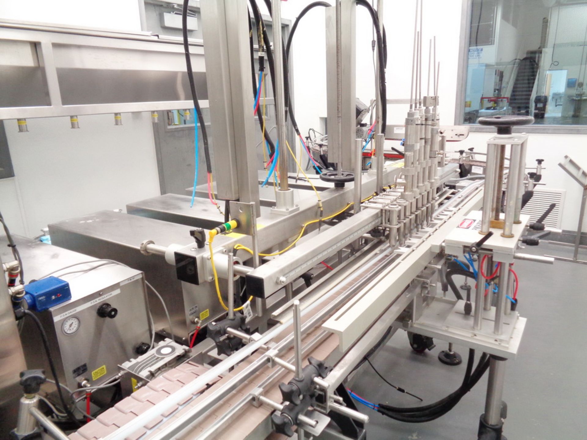 BULK LOT- CREAM PACKAGING LINE #2 (LOCATED IN CLEAN ROOM #2 DESIGNATED CL-2) UP TO (40) BOTTLES/MIN - Image 6 of 32