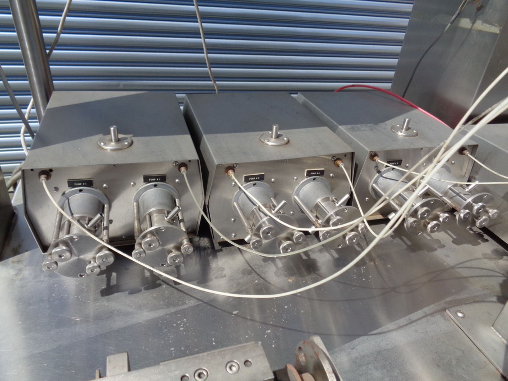 Oden 10-head electronic controlled rotary motion positive displacement filler. - Image 5 of 9