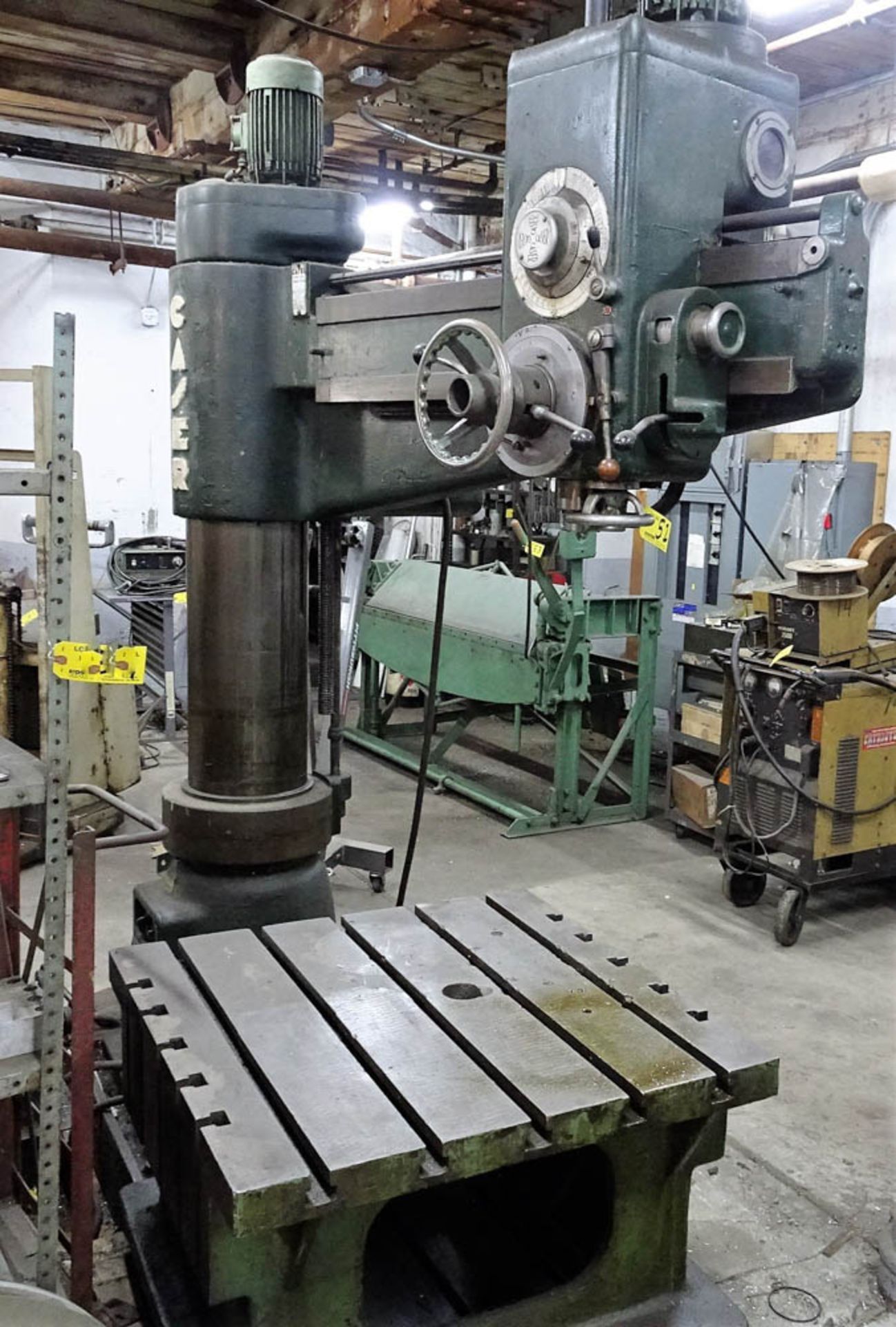 CASER MDL. 35-1250 RADIAL ARM DRILL WITH 36" X 36" T-SLOT RISER TABLE, APPROXIMATELY 48" TRAVEL, 12"