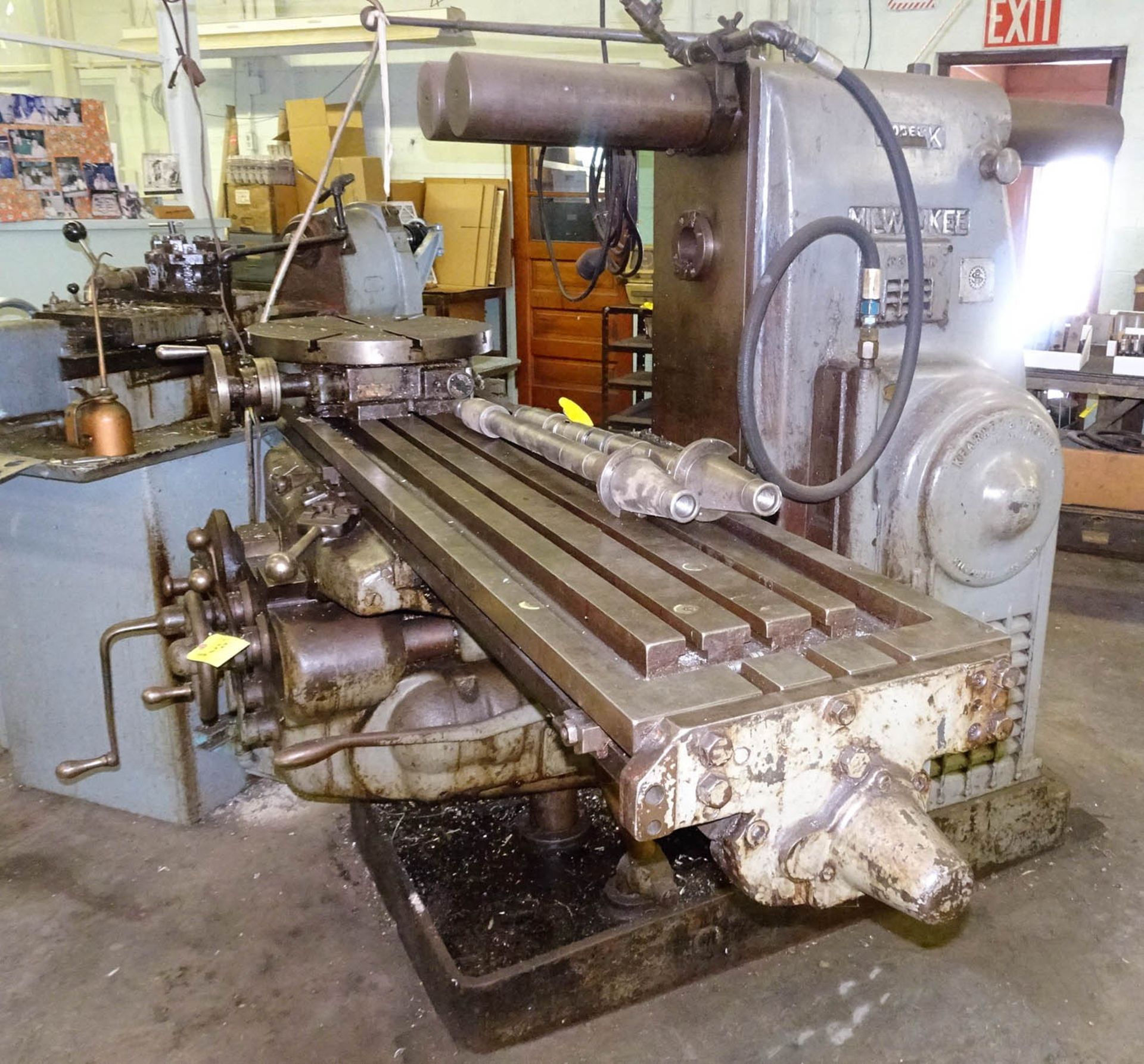 MILWAUKEE MDL. K HORIZONTAL MILLING MACHINE, WITH APPROXIMATELY 60" X 15" T-SLOT TABLE, S/N 6-