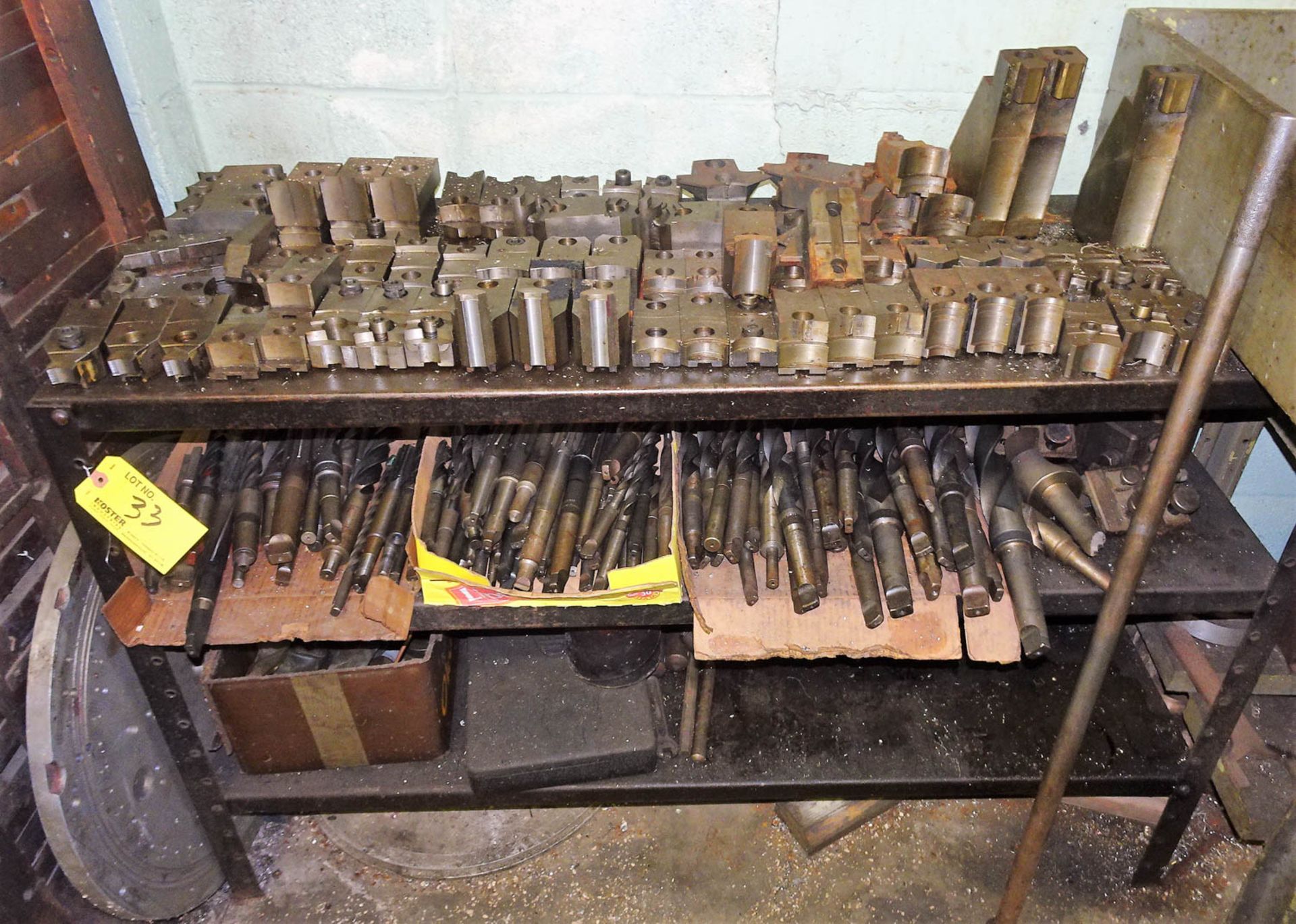 METAL SHELVING UNIT WITH CONTENTS, INCLUDING: NUMEROUS CHUCK JAWS AND DRILL BITS