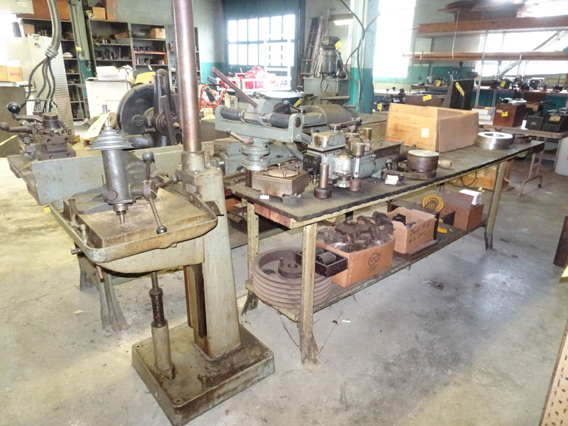 (2) STEEL FRAMED WOOD TOP WORK BENCHES WITH CONTENTS, INCLUDING: TRACER MACHINE PARTS, THREAD